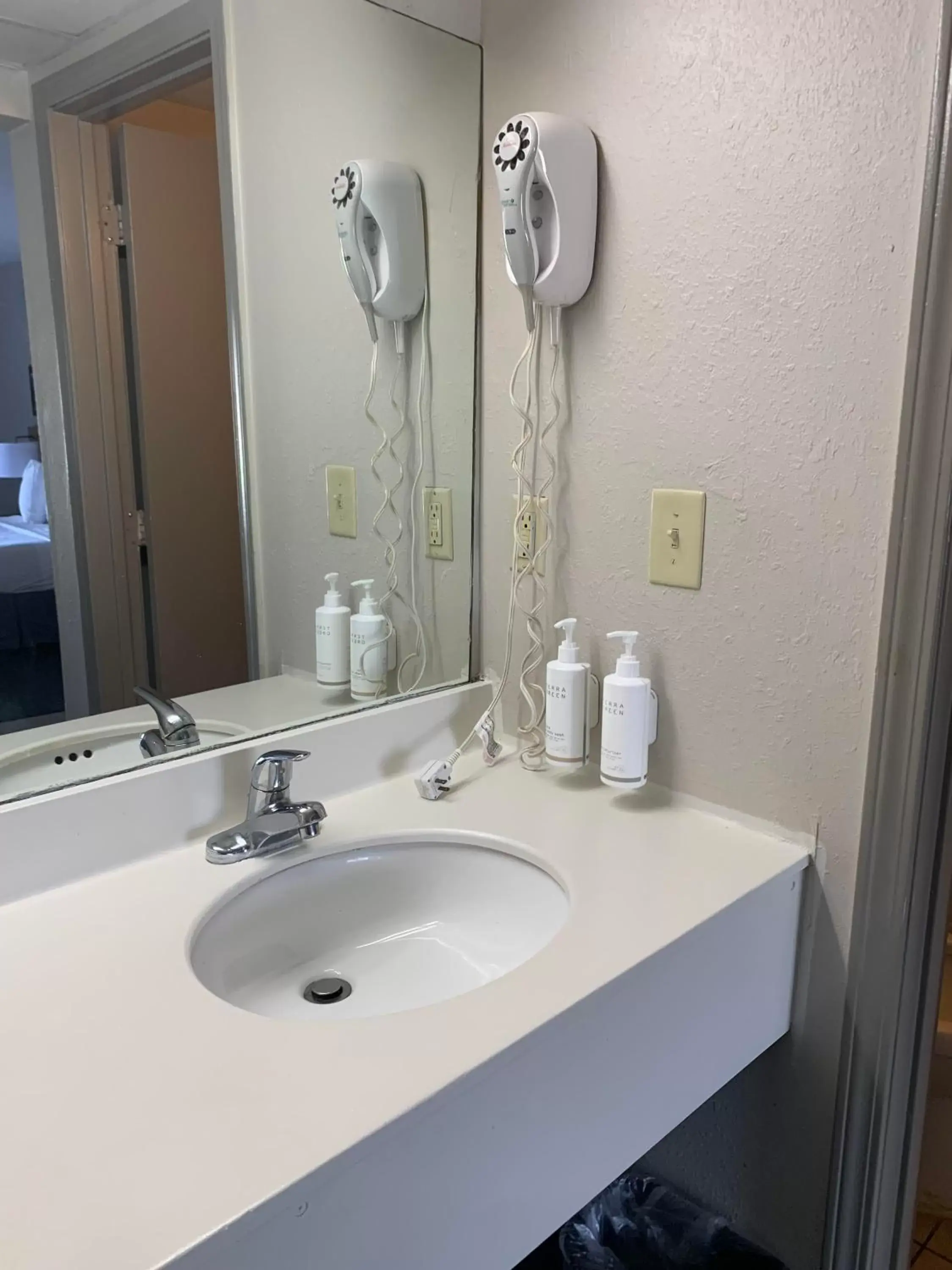 Bathroom in Days Inn by Wyndham Louisville Airport Fair and Expo Center