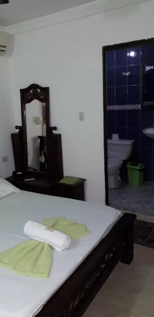 Bed in Hotel Mansión del Cesar