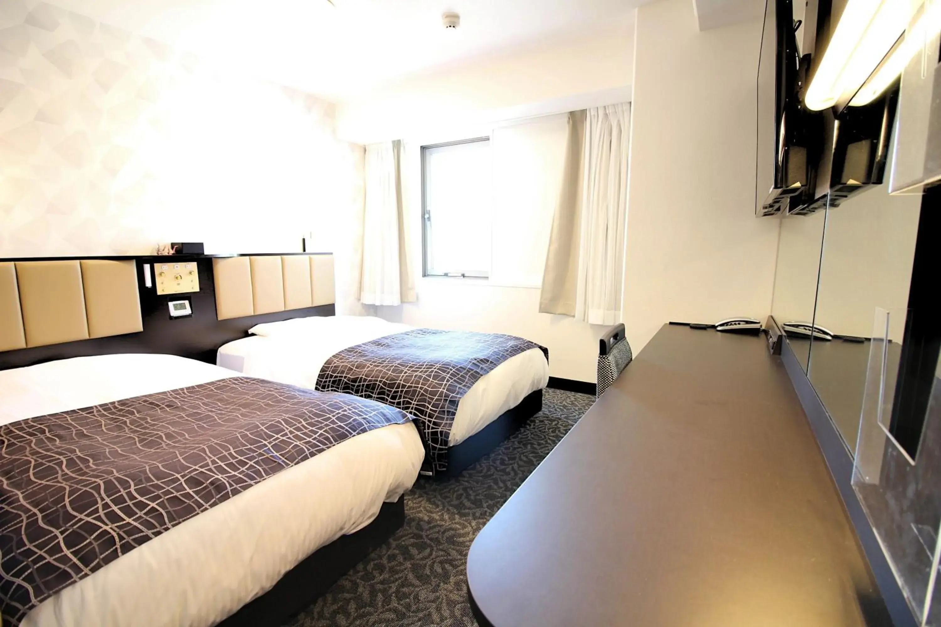 Photo of the whole room, Bed in APA Hotel Sagaeki Minamiguchi