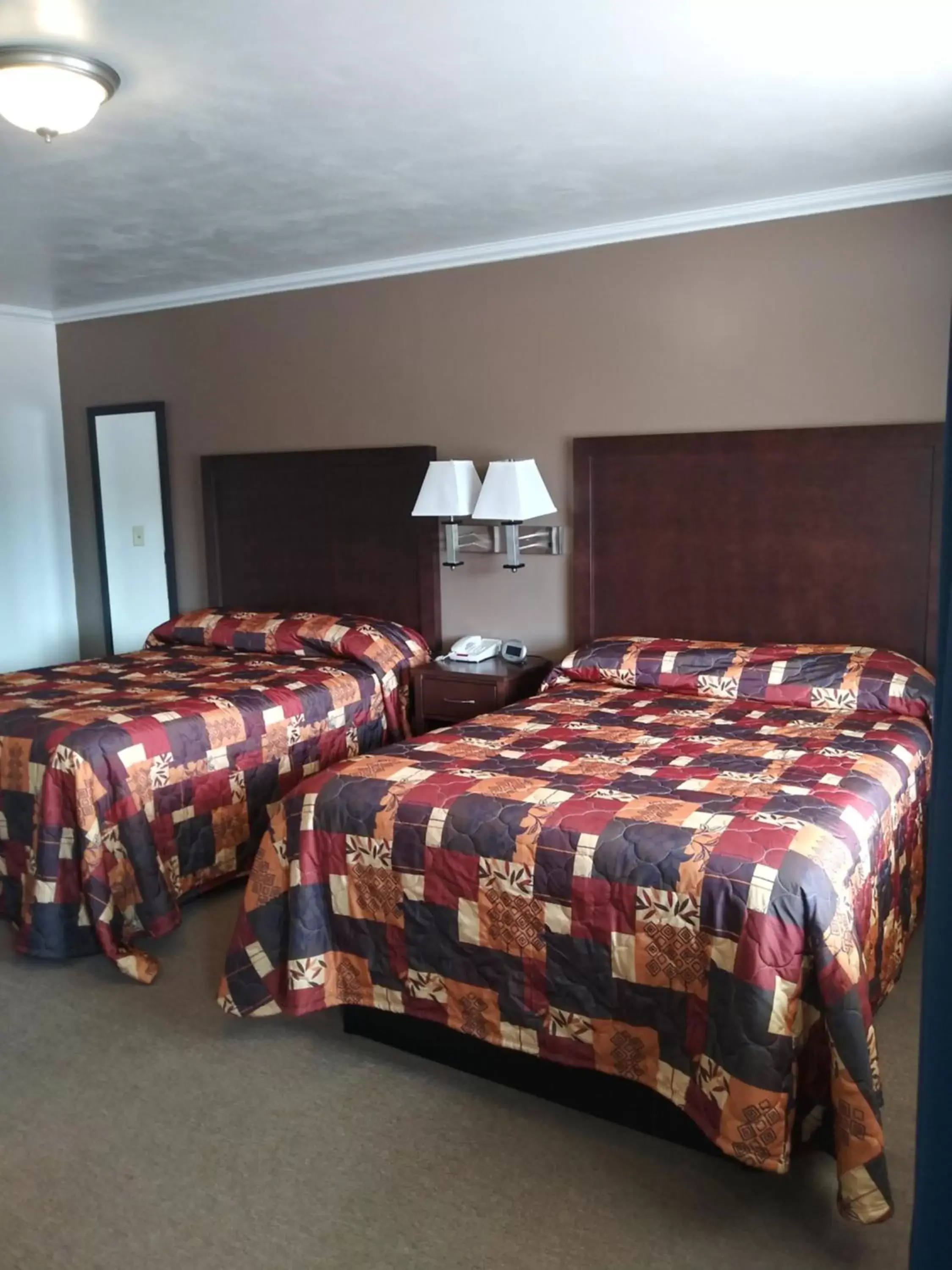 Bed in Centennial Motel