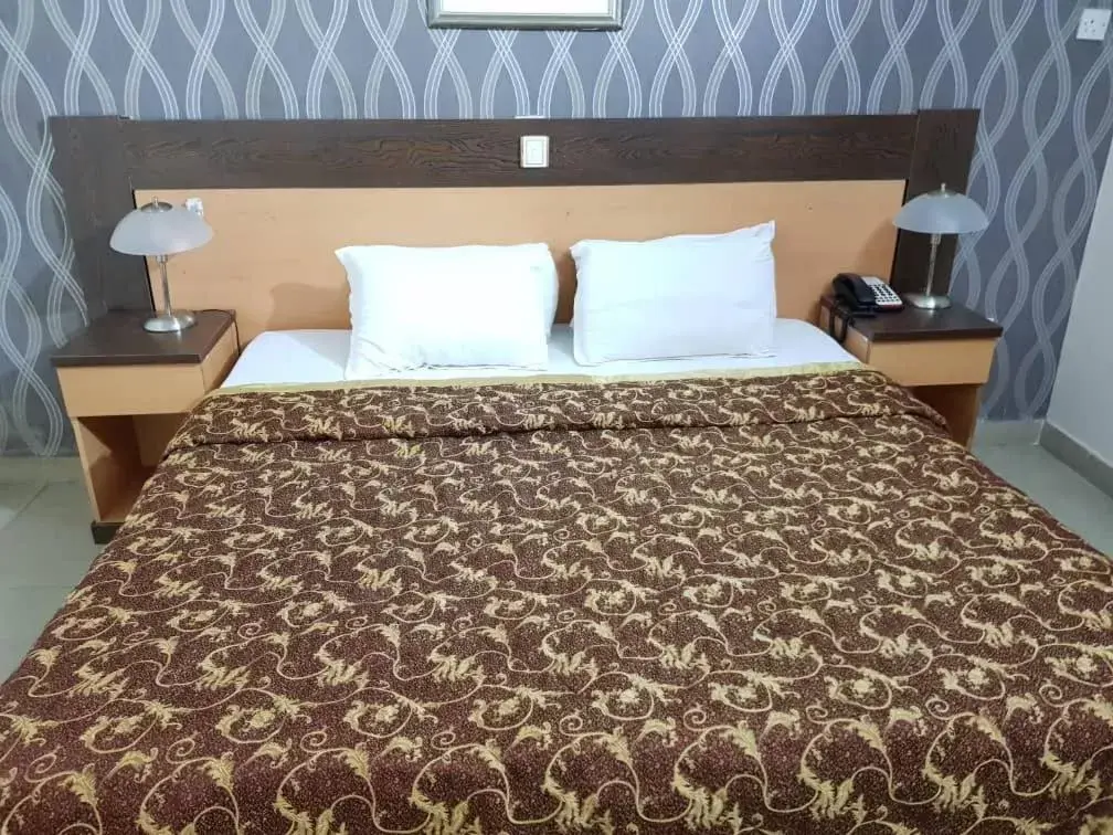 Bed in Citilodge Hotel