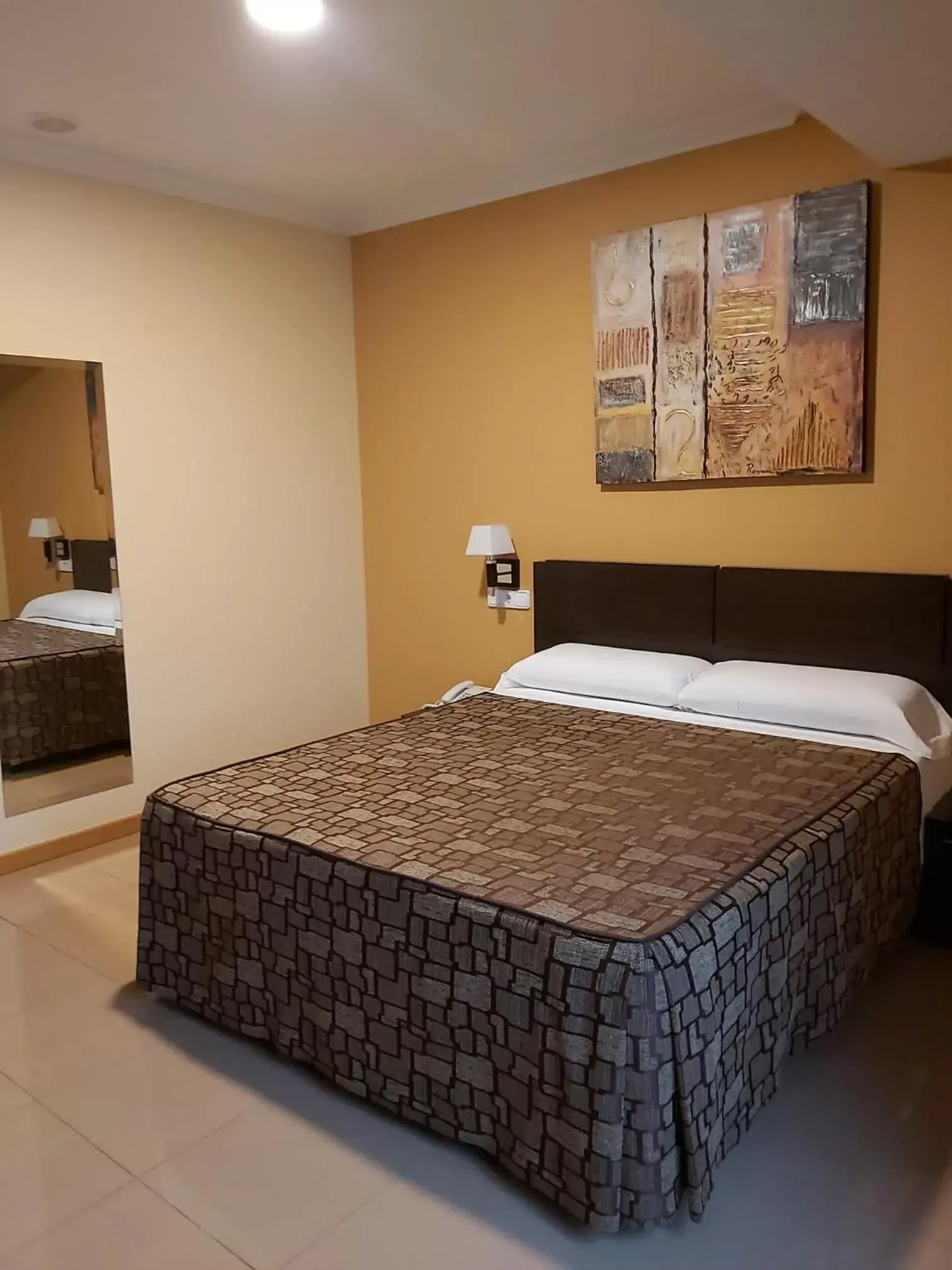 Bed in Hotel Reigosa