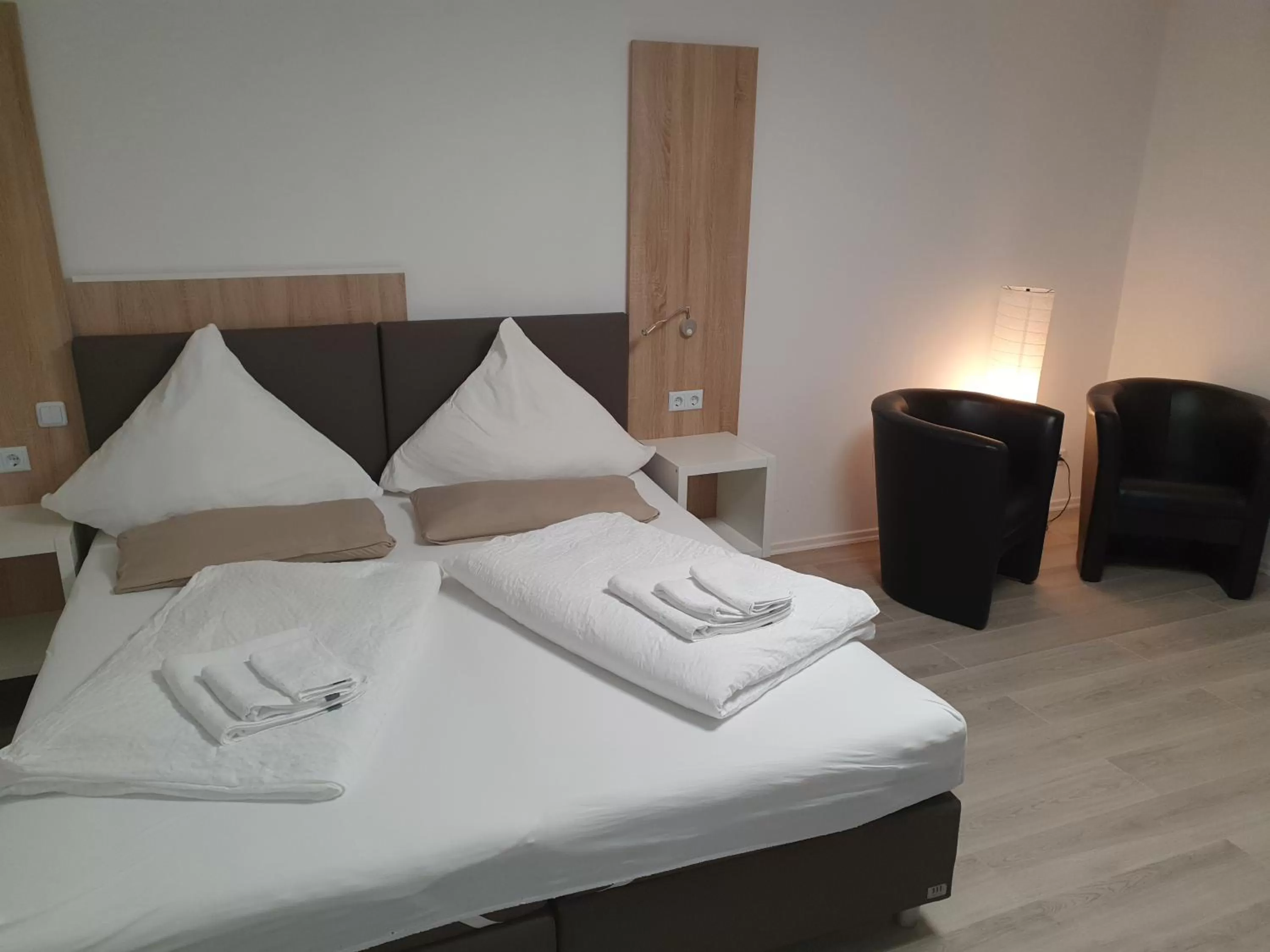 Bed in Hotel Exquisite