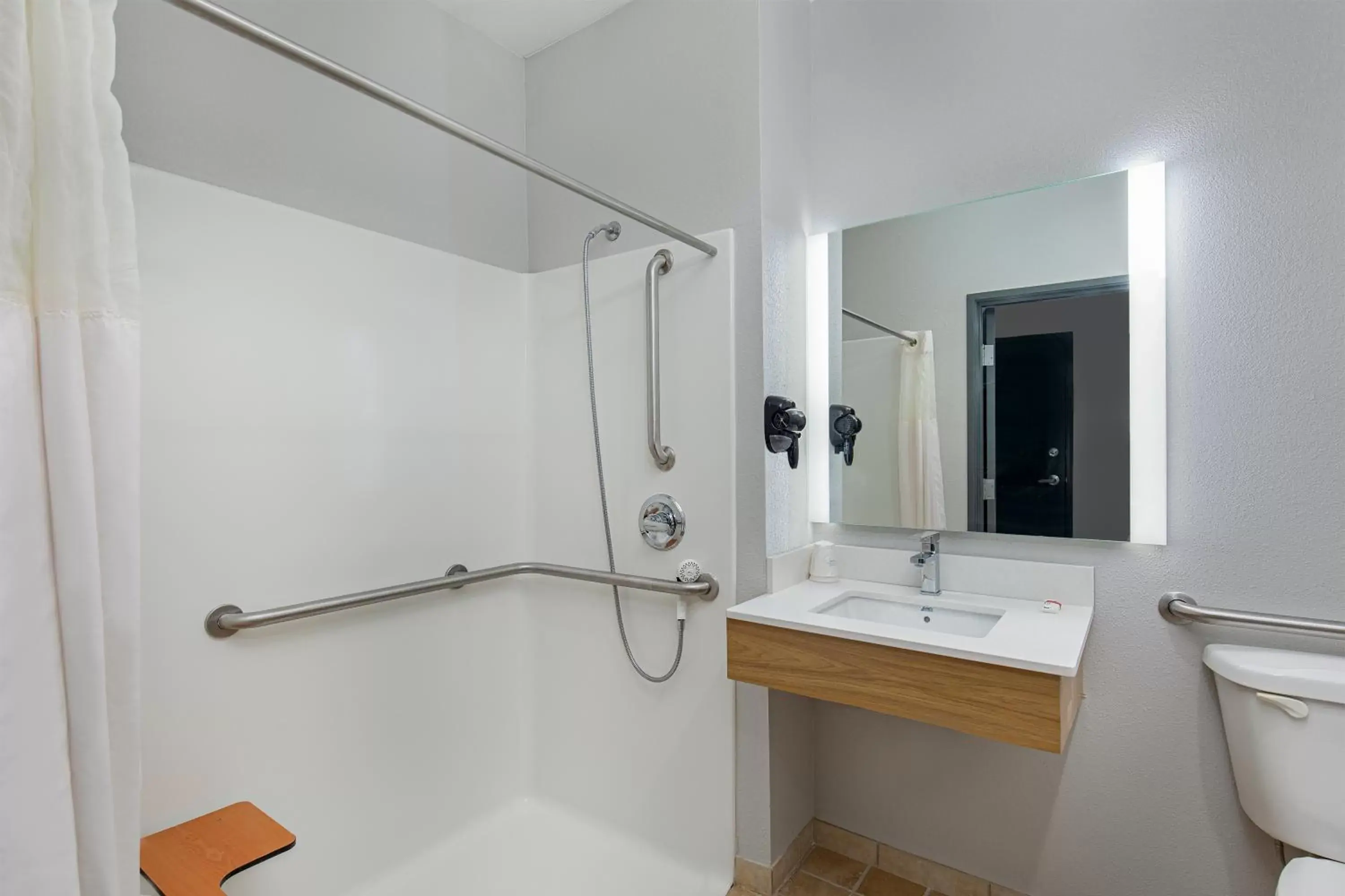 Bathroom in Microtel Inn & Suites by Wyndham Manchester - Newly Renovated