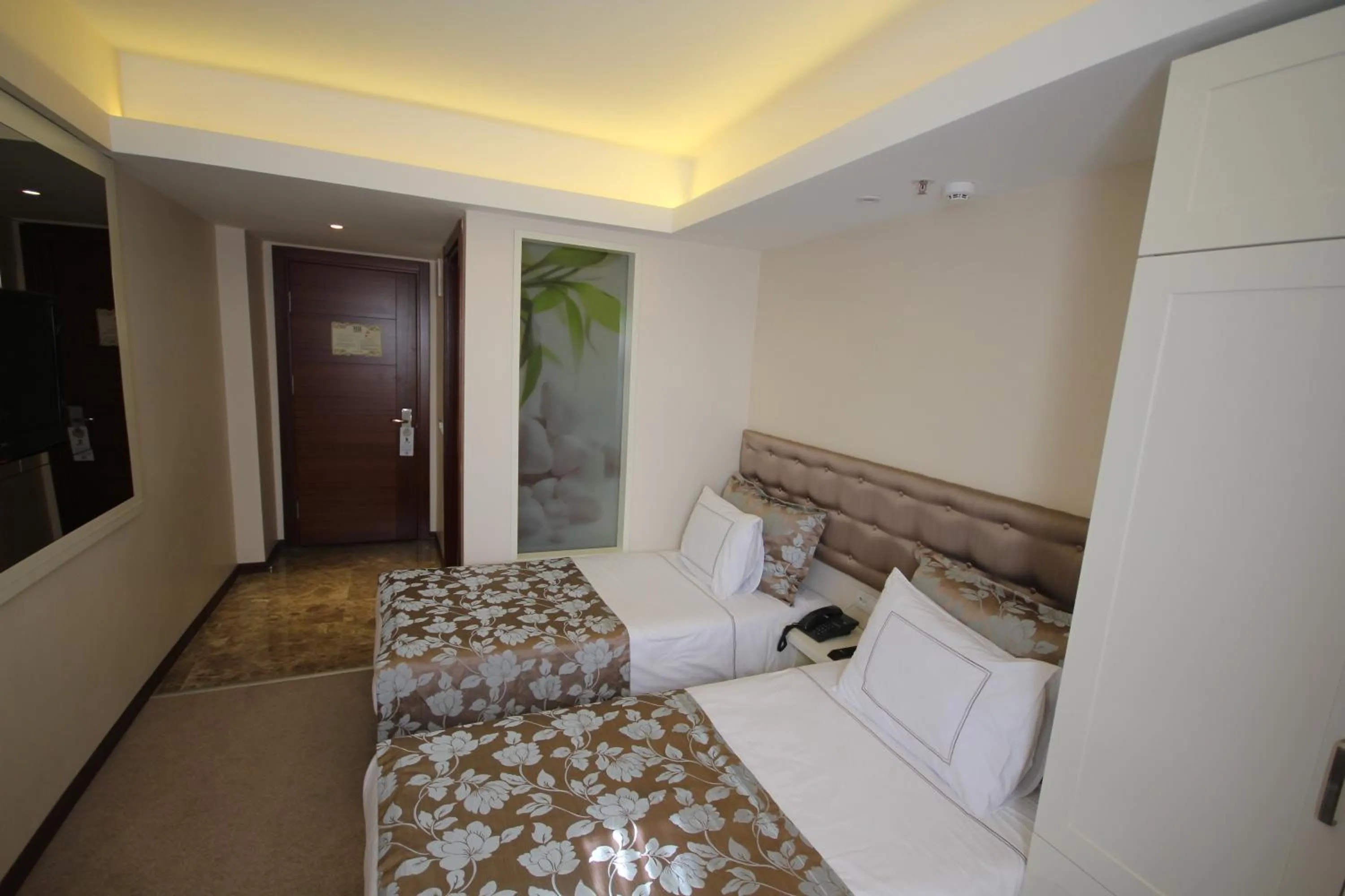 Bed in Grand Washington Hotel