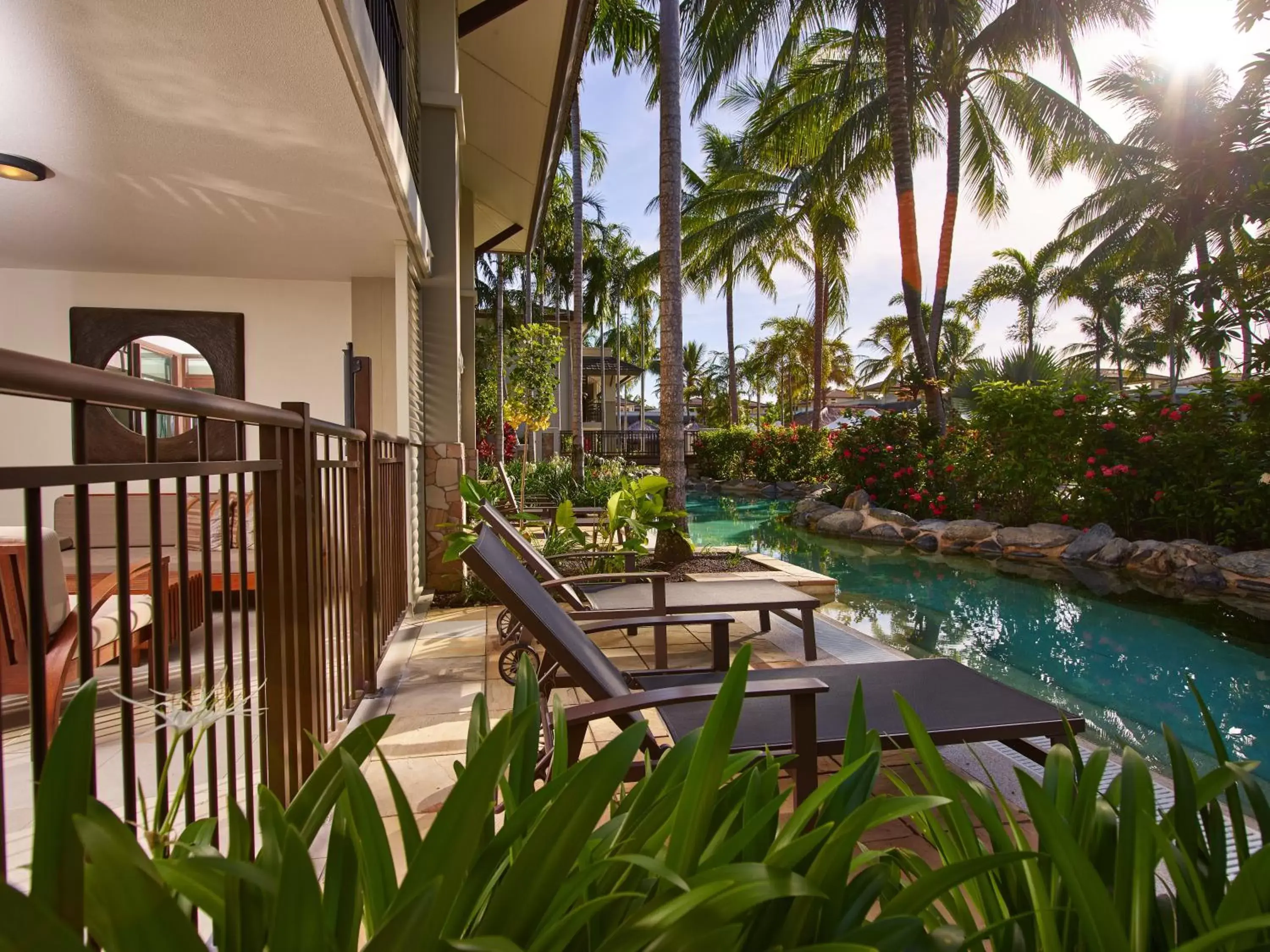 Patio, Swimming Pool in Pullman Port Douglas Sea Temple Resort and Spa