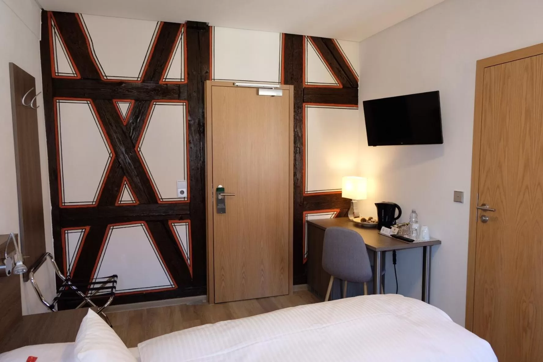 Seating area, Bed in Gästehaus zur Sonne