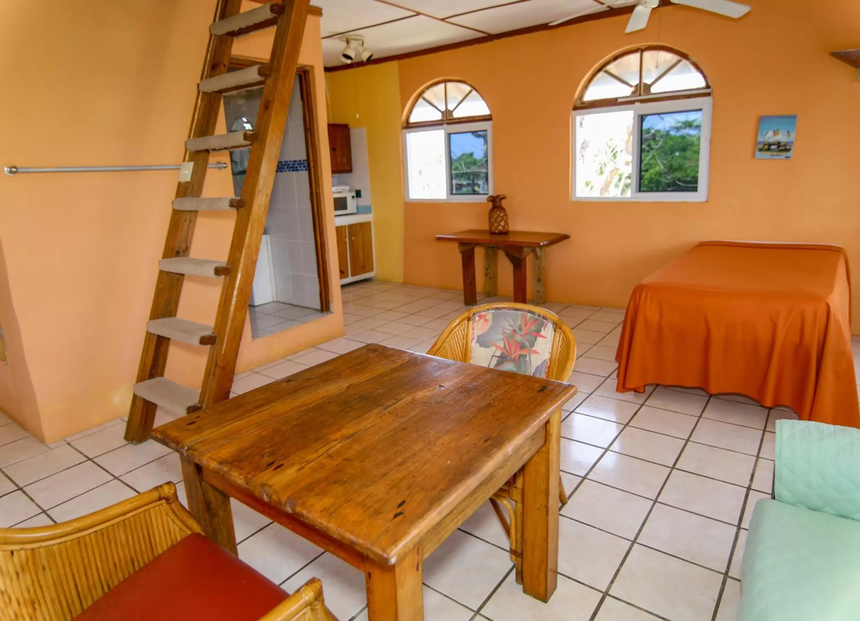 Bed, Dining Area in Home Sweet Home Resort