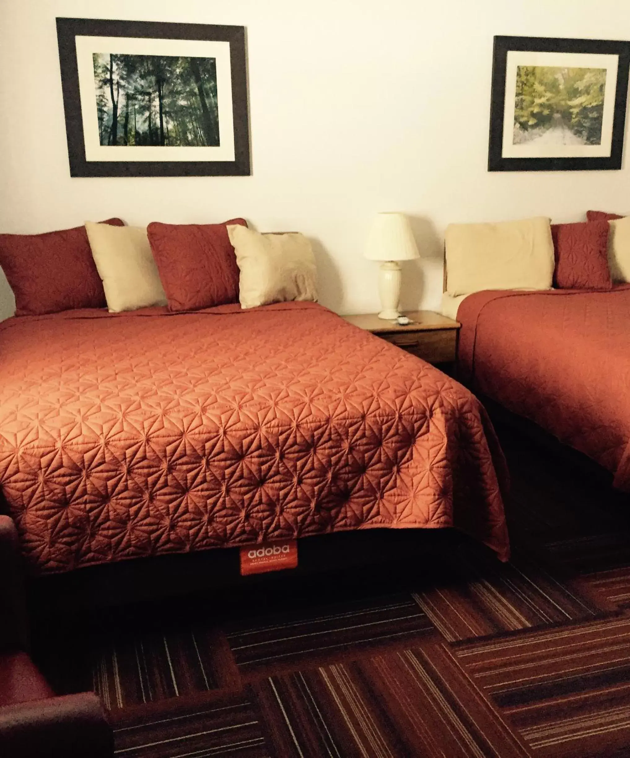 Bed in adoba® hotel Naubinway