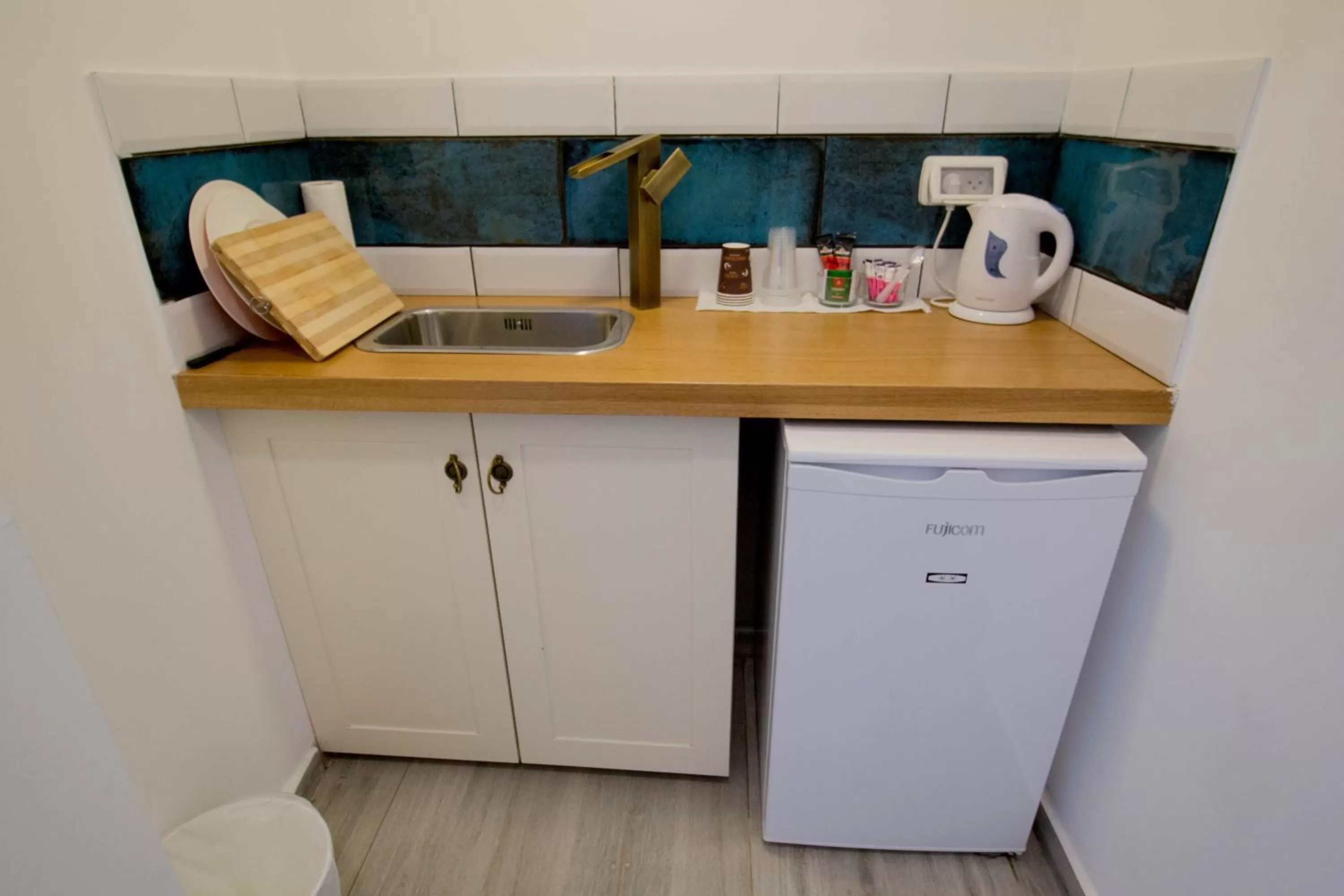 Kitchen or kitchenette in Eshel Mansion - Boutique Suites