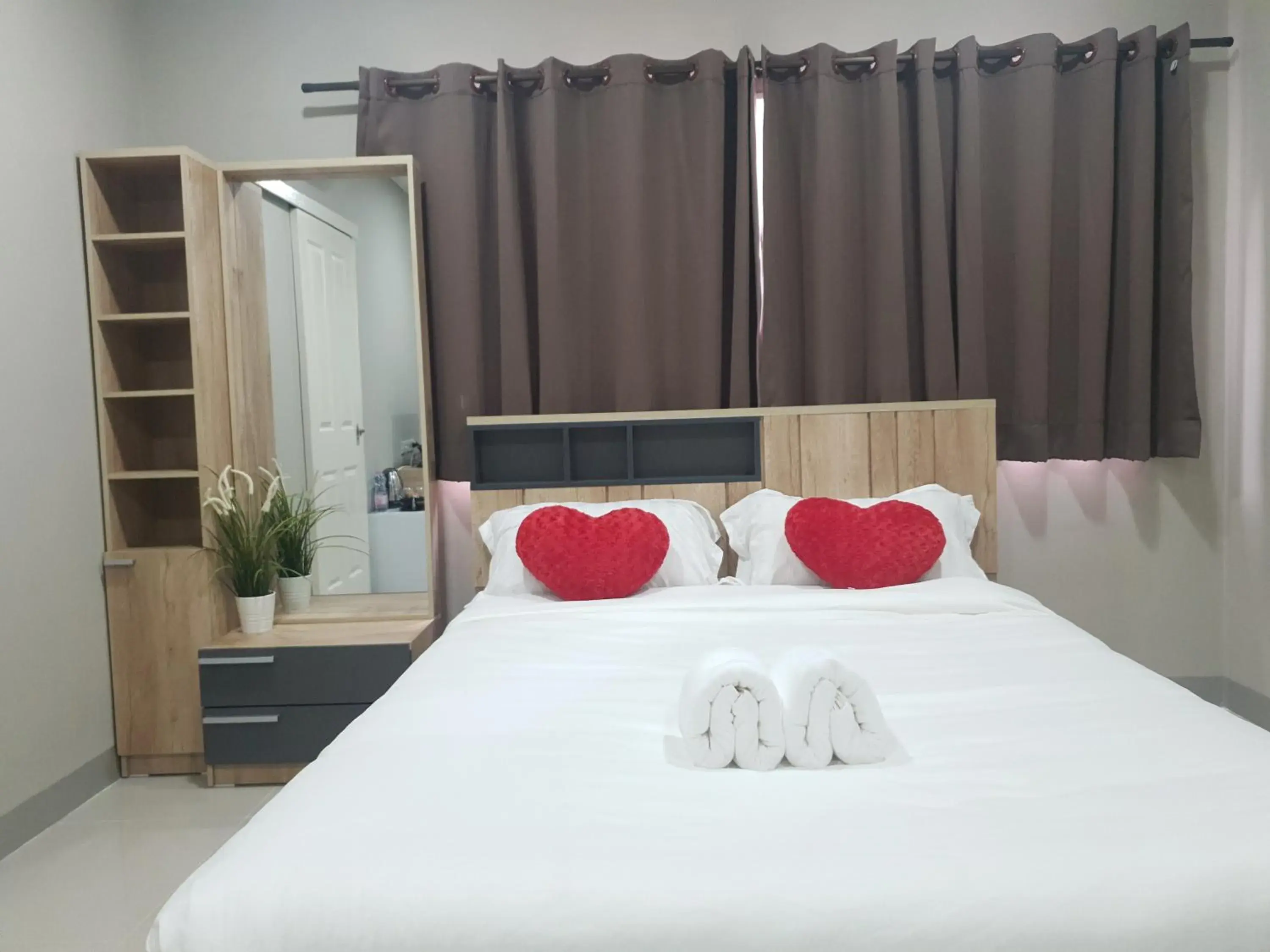 Bed in iResidence Hotel Pathumthani