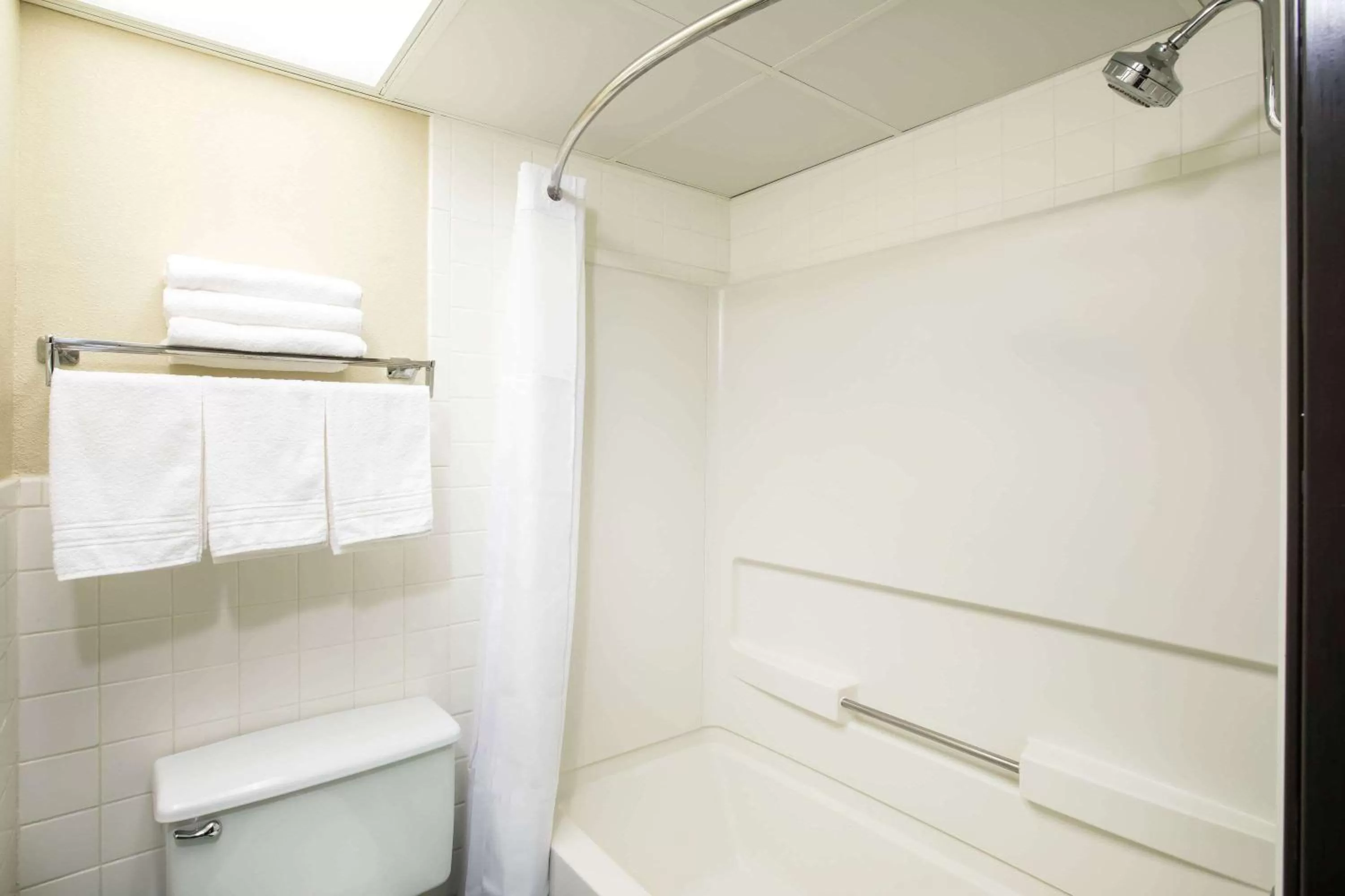 Bathroom in Super 8 by Wyndham Wichita East