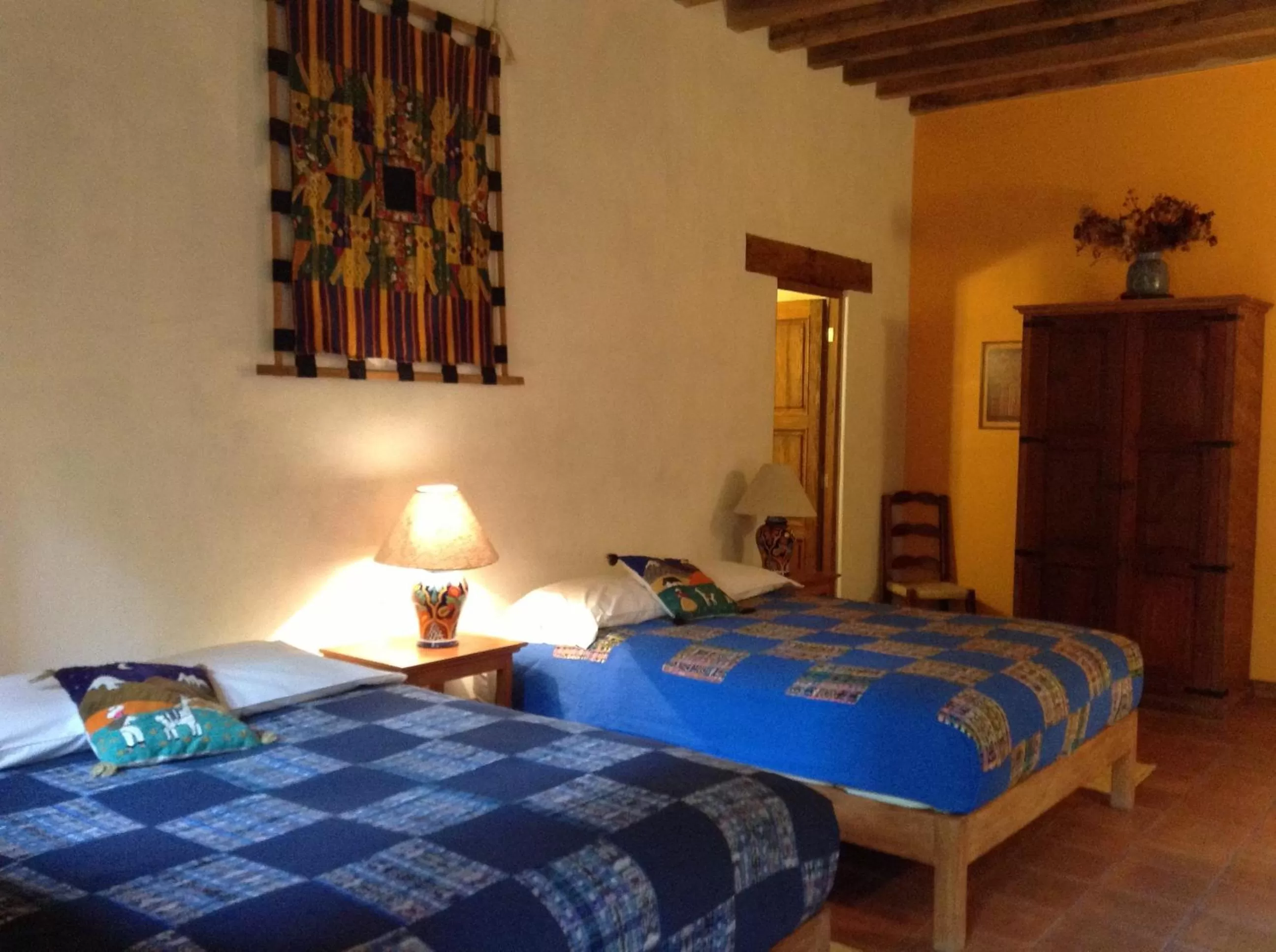 Photo of the whole room, Bed in Posada Yolihuani
