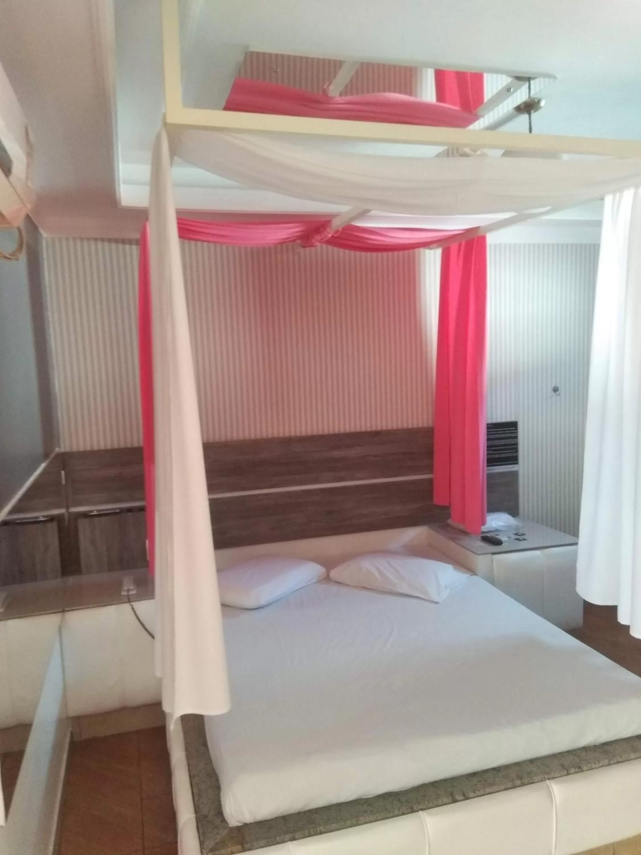 Bed in Classic Hotel e Motel