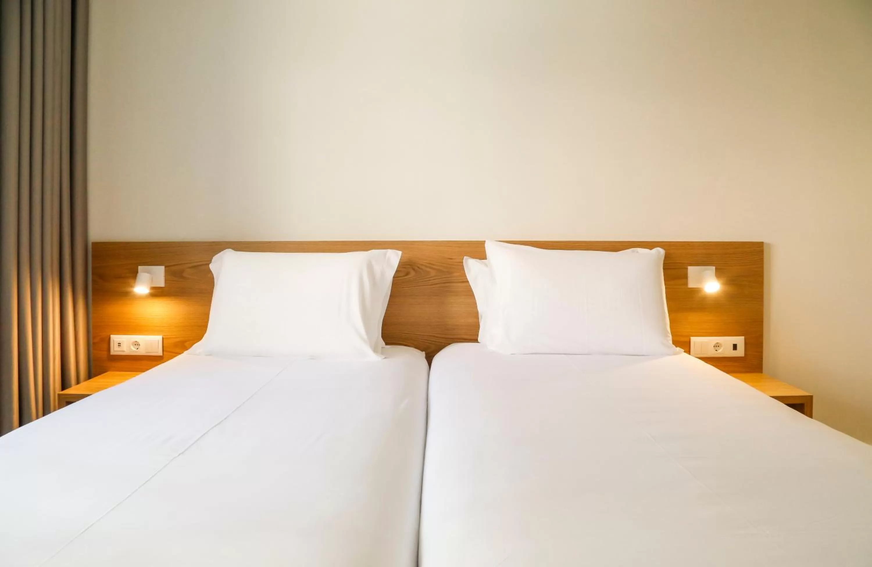 Bed in Hotel Spot Family Suites