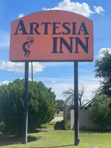 Property logo or sign in Artesia Inn- No Service Fees