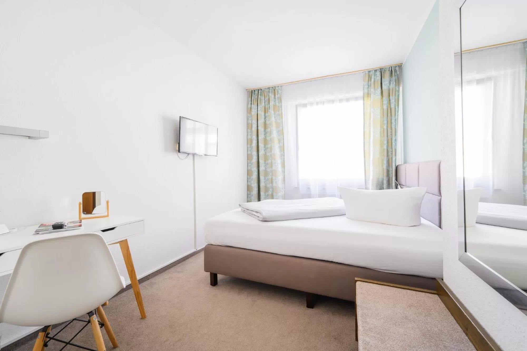 Bed in Hotel Kaspar Garni