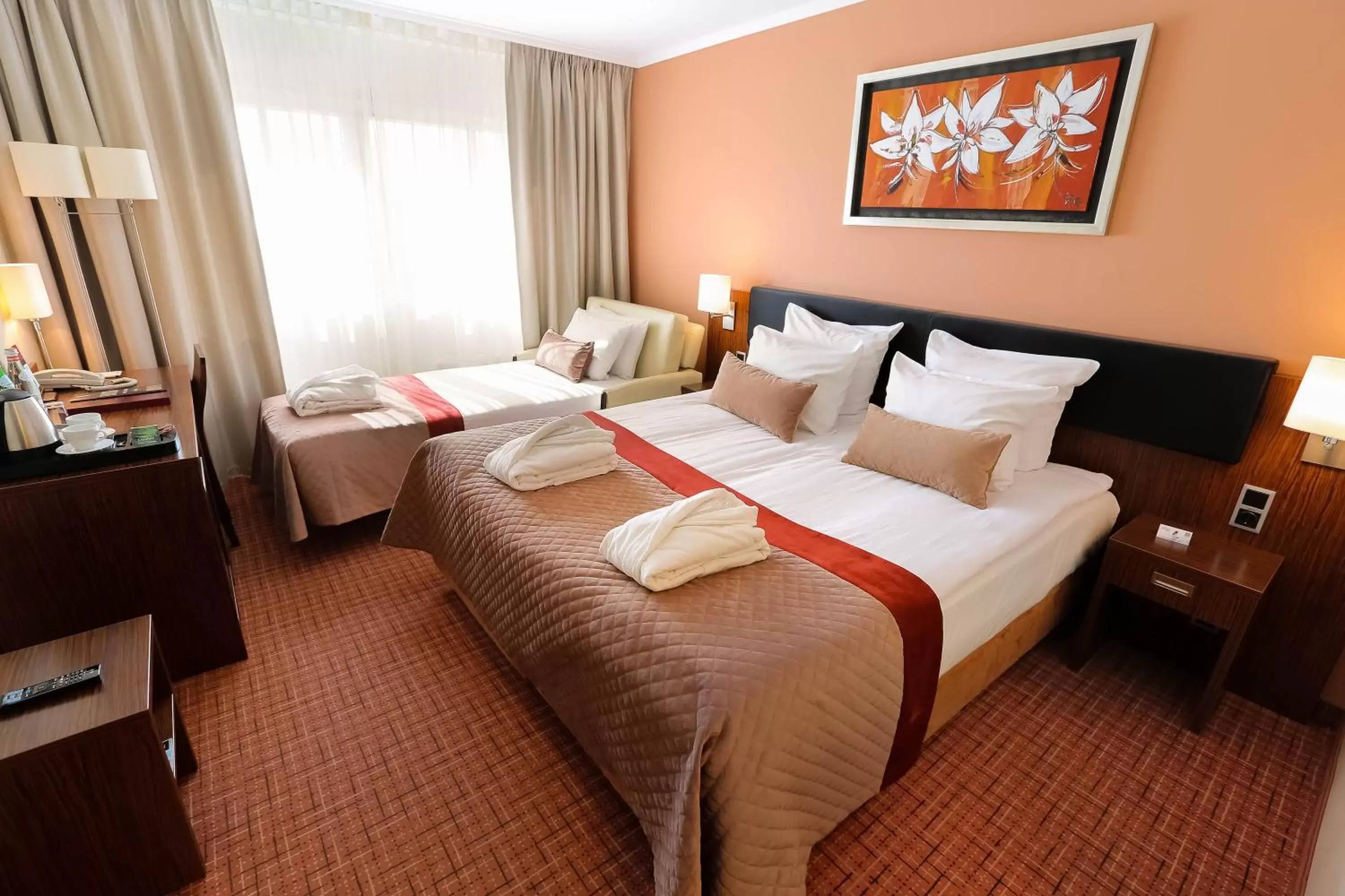 Bed in Avalon Hotel & Conferences