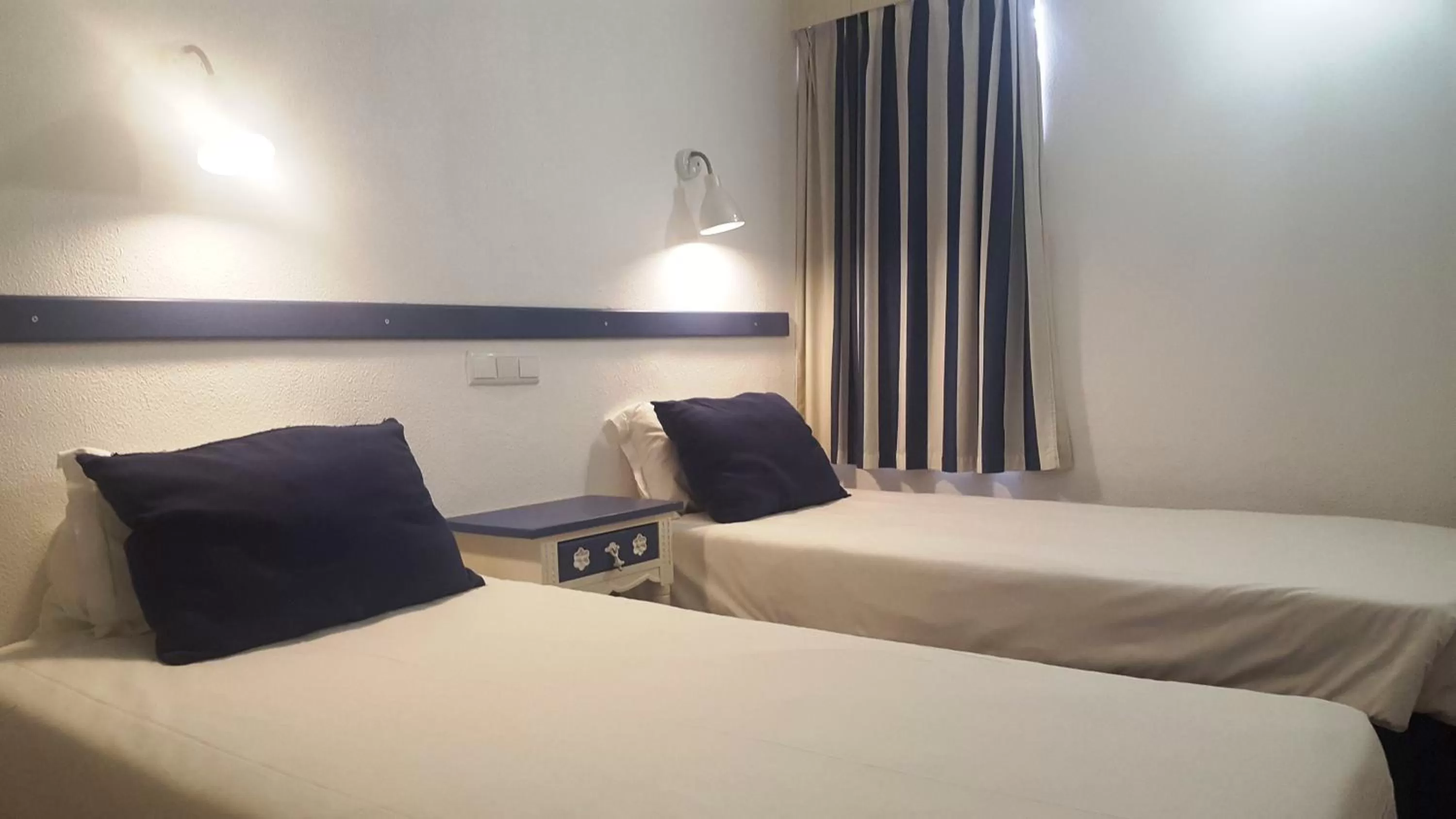 Bed in Apartamentos Turisticos Soldoiro