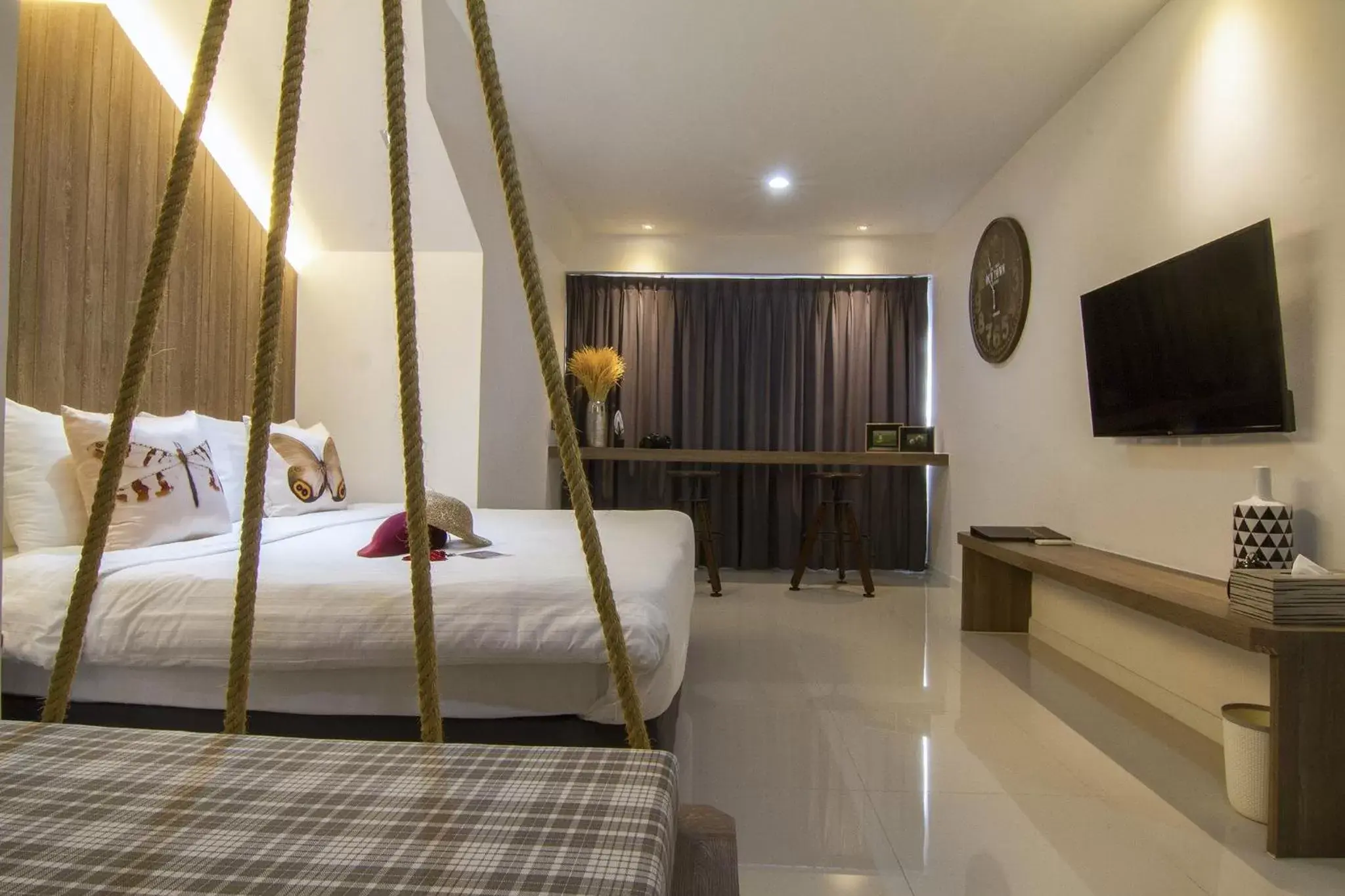 Bed in Bossotel Chiang Mai - SHA Plus