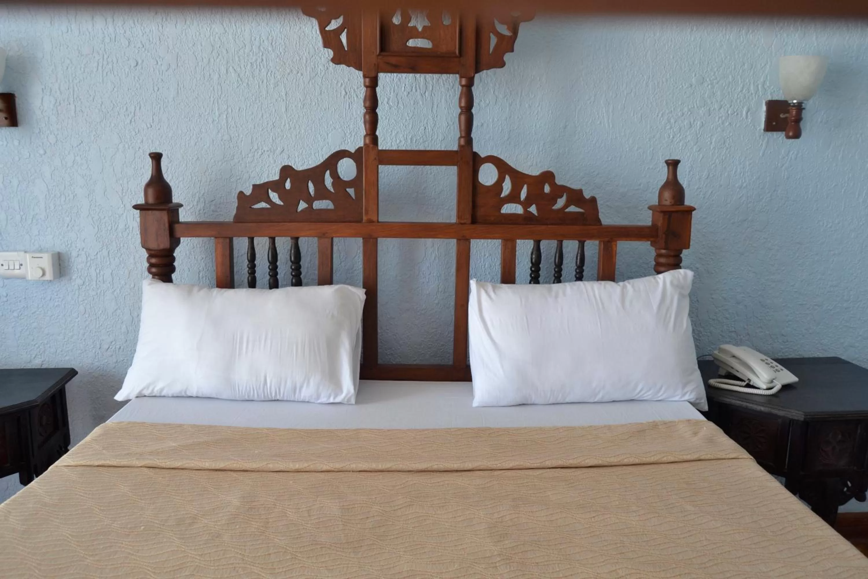 Bed in Serene Beach Resort
