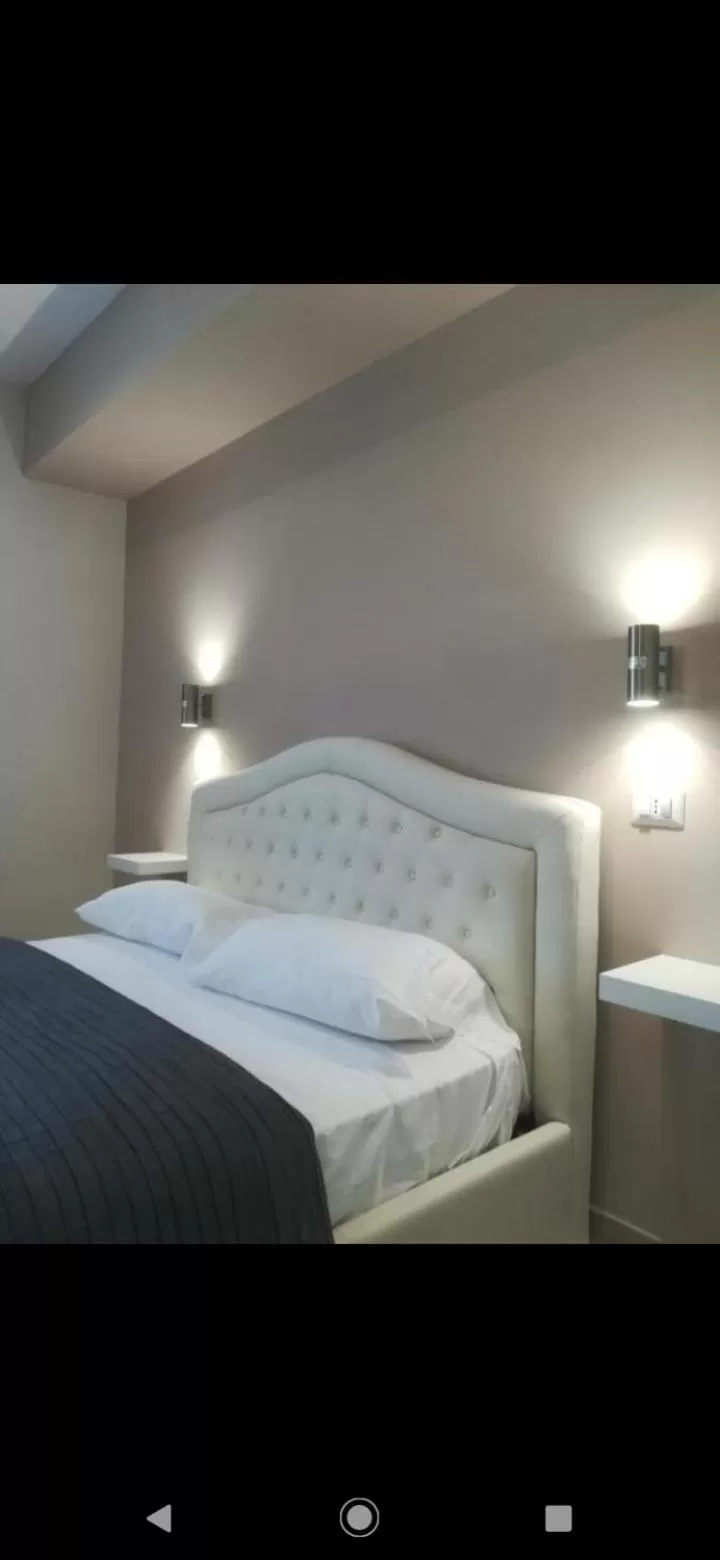 Bed in B&B Purple Italy