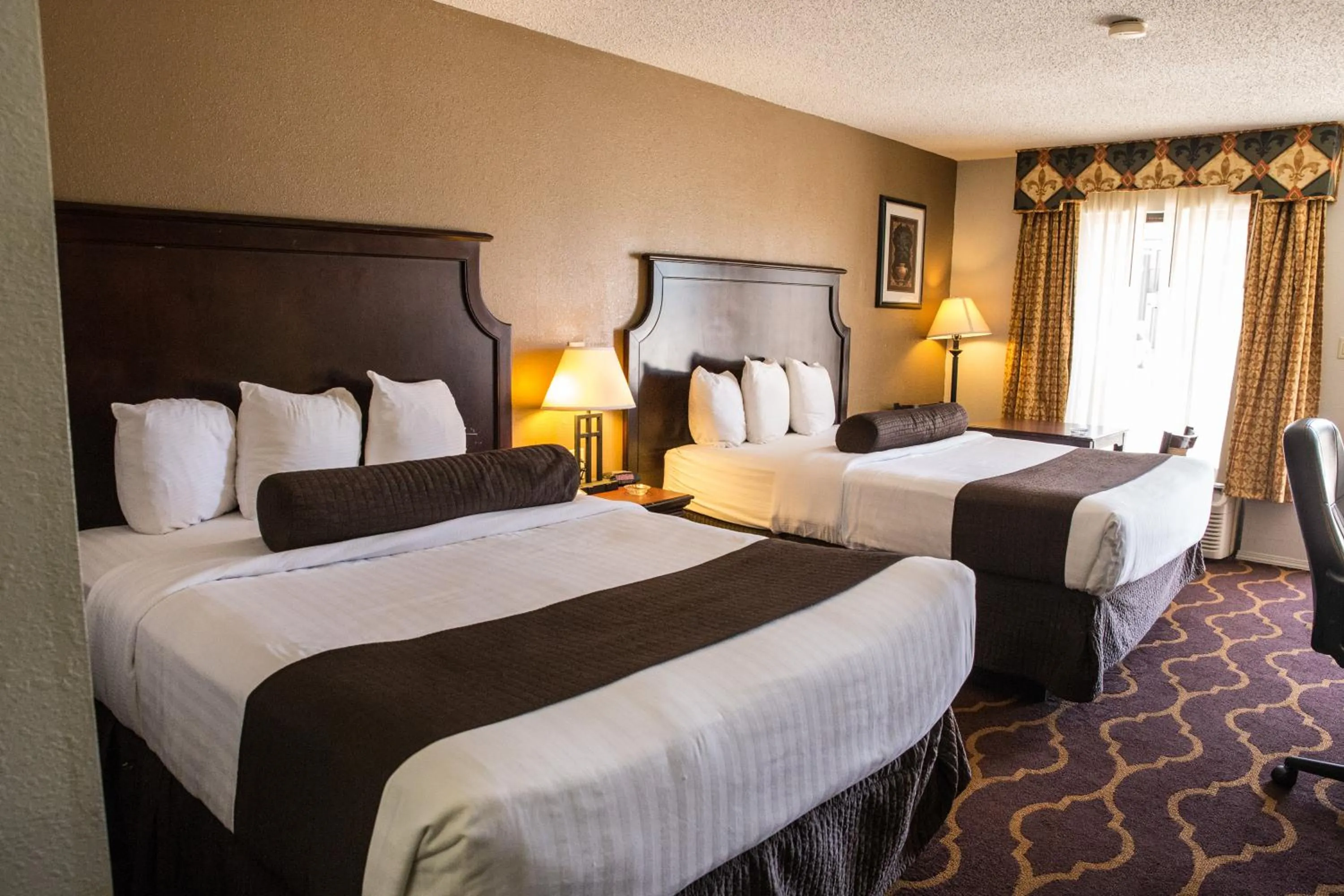 Bedroom, Bed in Mockingbird Inn & Suites