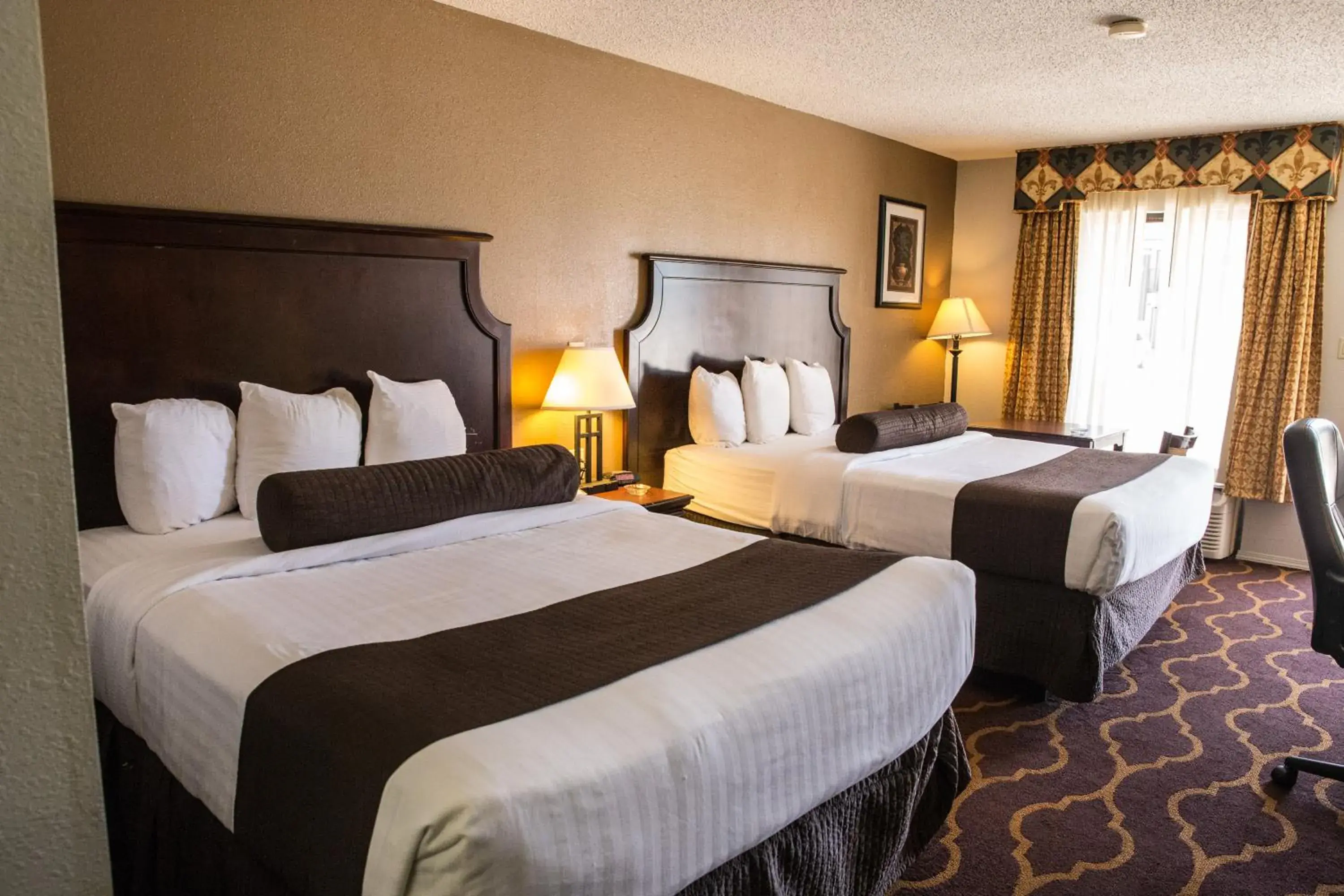 Bedroom, Bed in Mockingbird Inn & Suites Bedroom, Bed in Mockingbird Inn & Suites