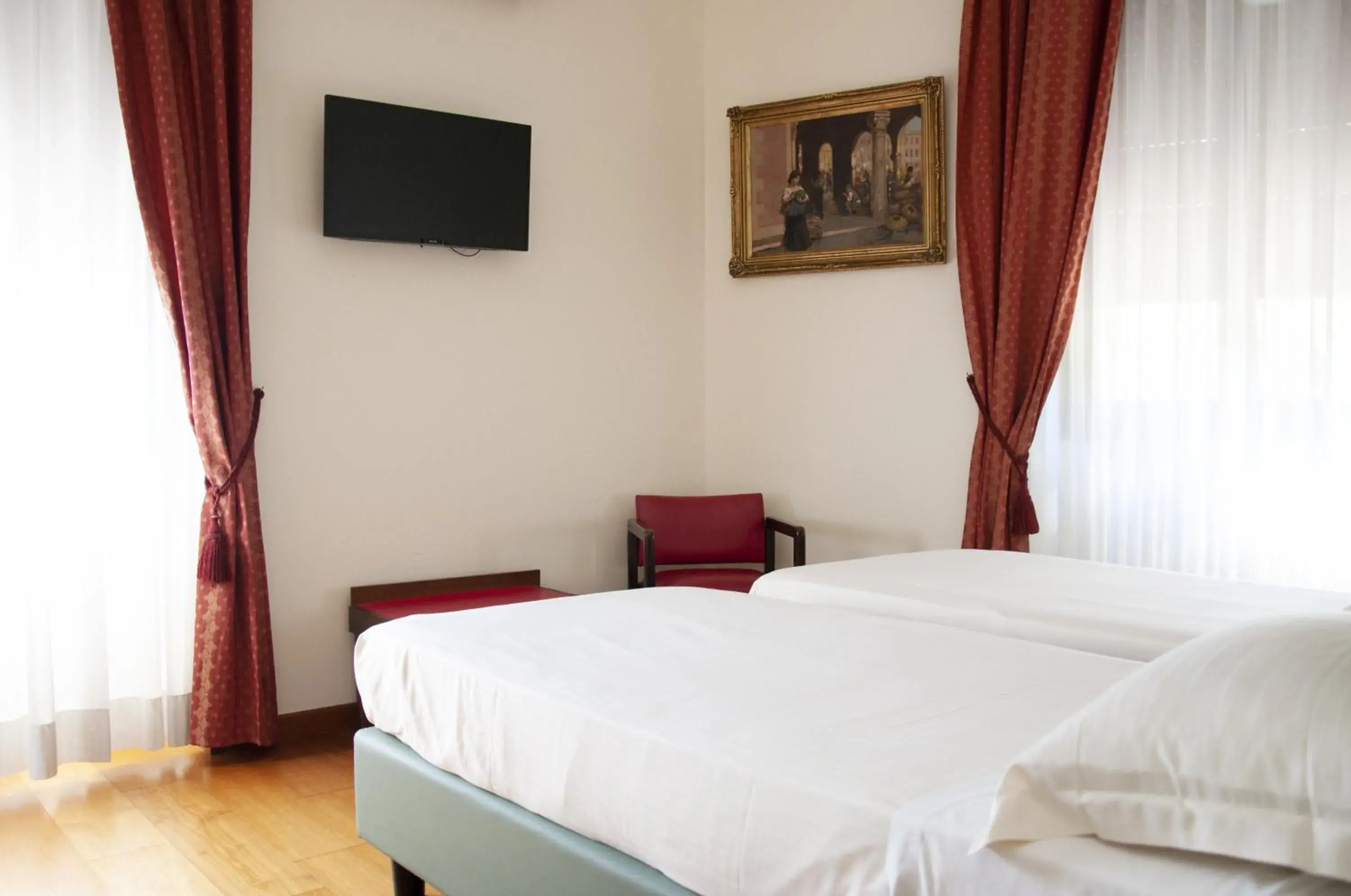 Bed in Hotel San Guido