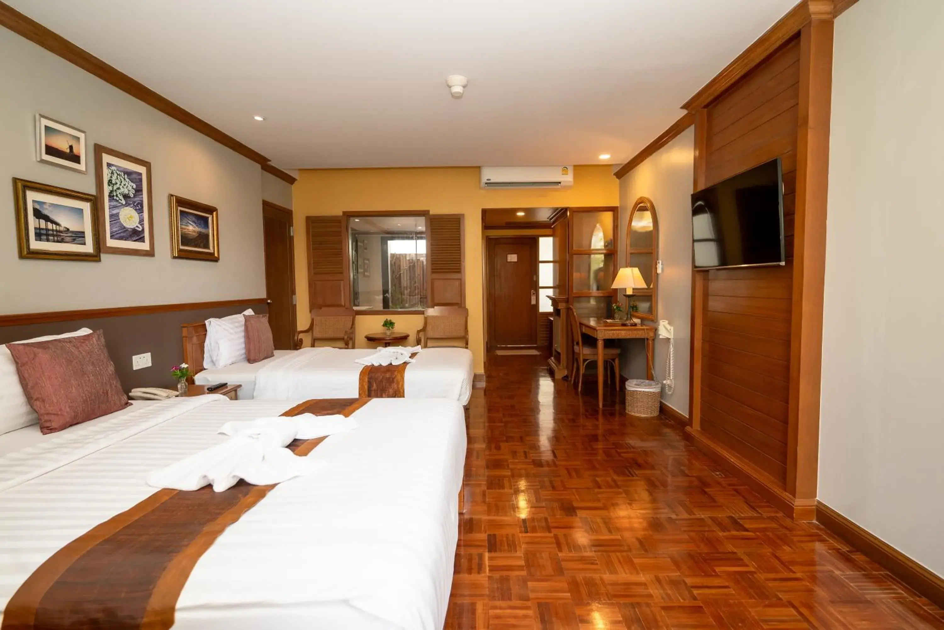 Bed in Comsaed River Kwai Resort SHA