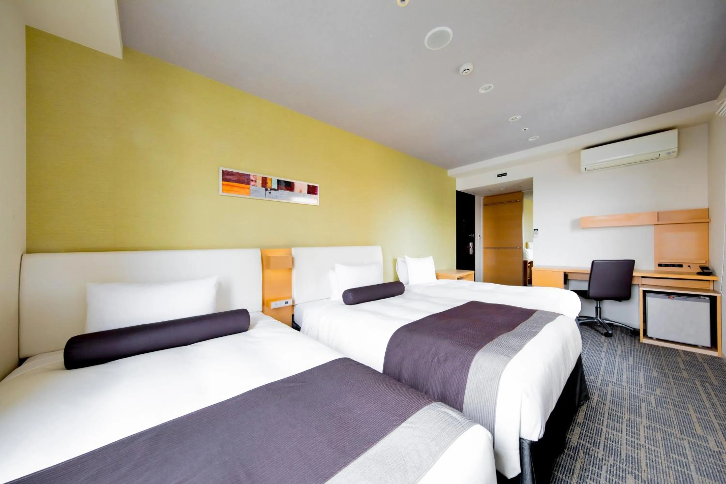 Bed in Tokyu Stay Kamata - Tokyo Haneda