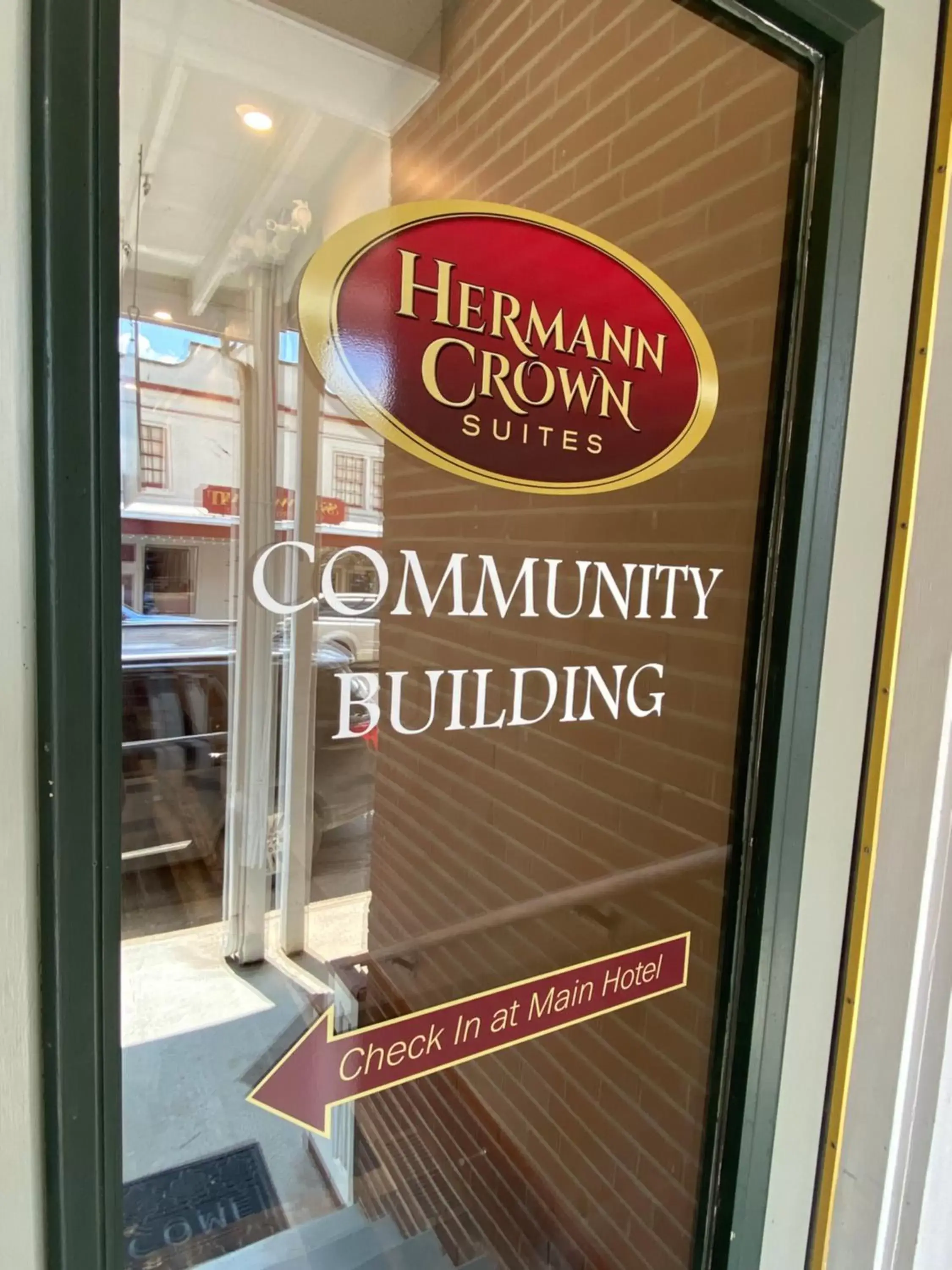 Property Logo/Sign in Hermann Crown Suites
