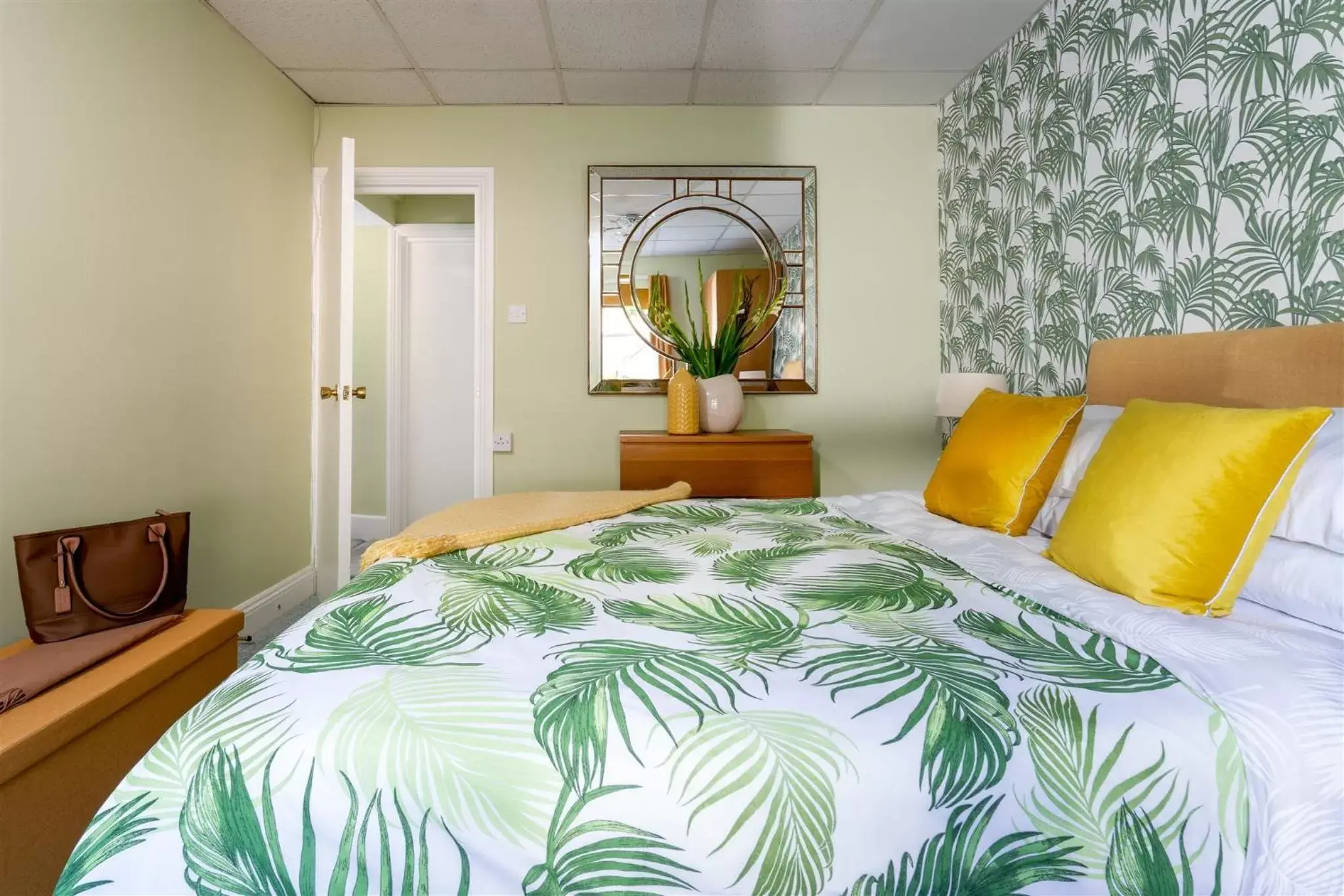 Bed in Palm Grove Apartments