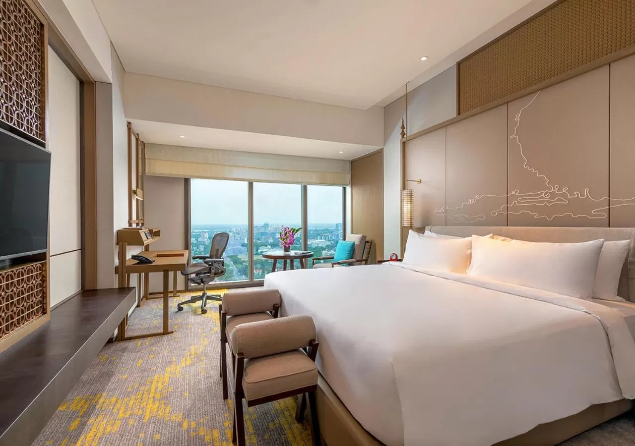 Photo of the whole room, Bed in Pan Pacific Yangon