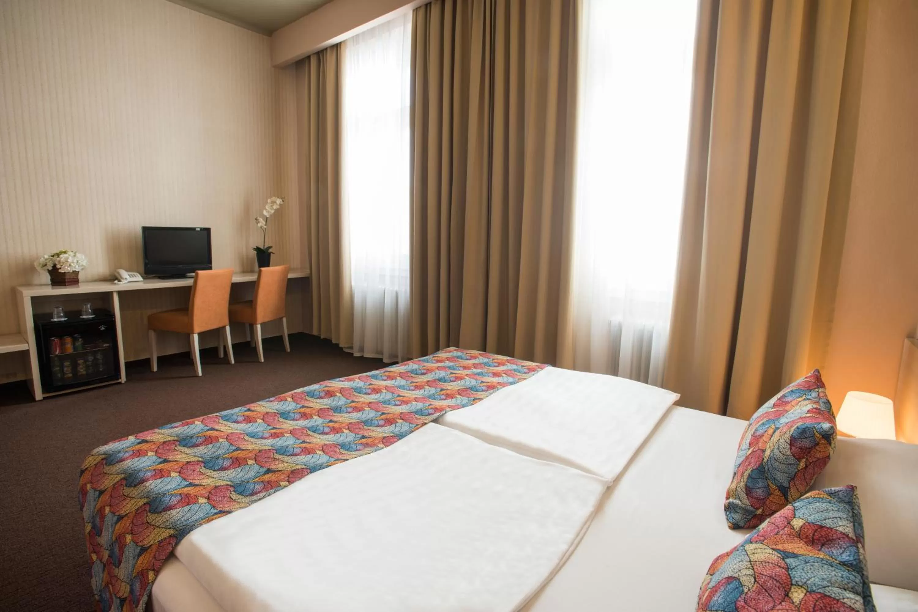 Bed in Star City Hotel