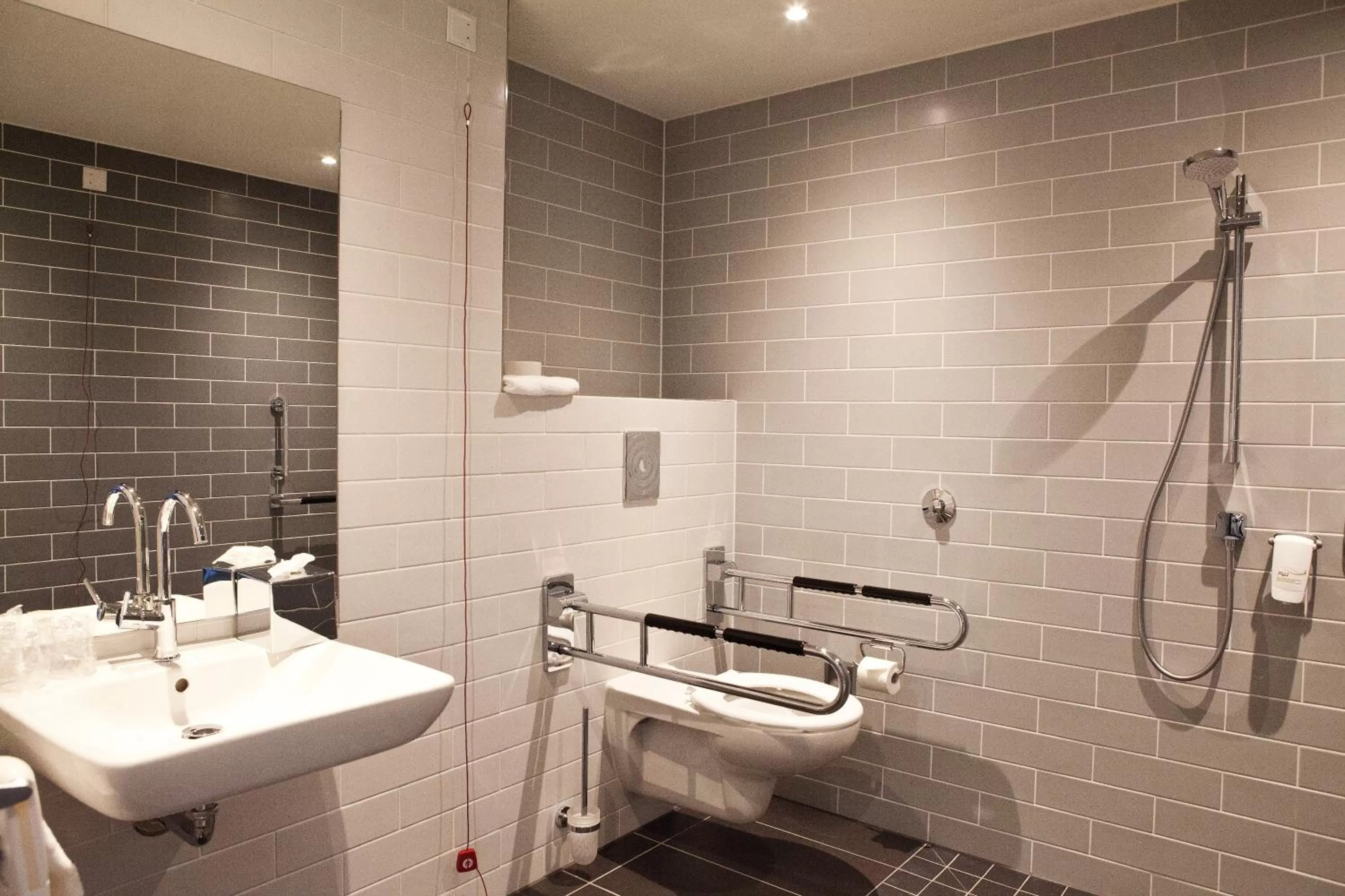 Bathroom in Holiday Inn Express Munich - Olympiapark by IHG