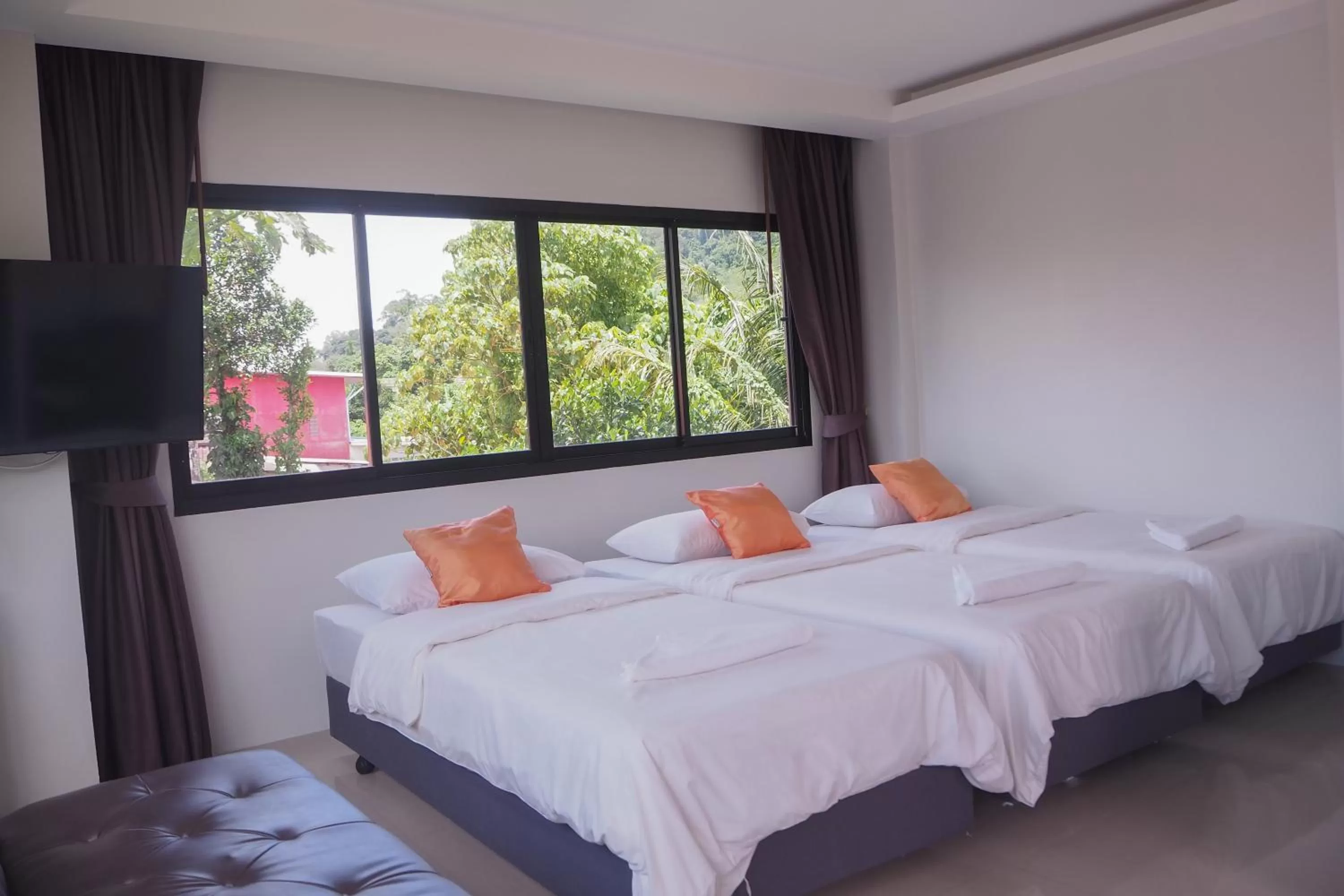 Bed in Rakkawan Residence