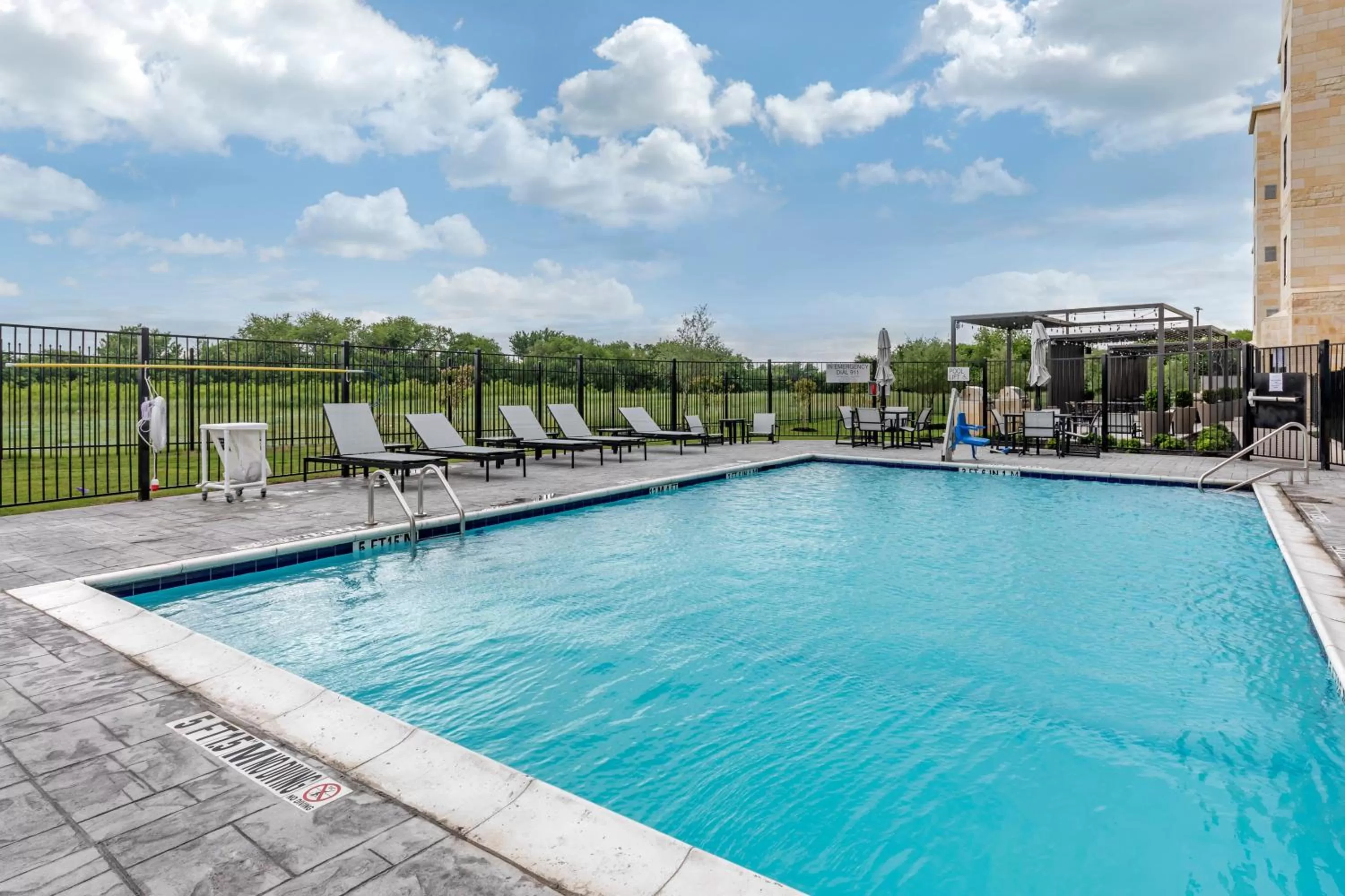 Swimming pool in Staybridge Suites Grand Prairie Near Epic Central by IHG