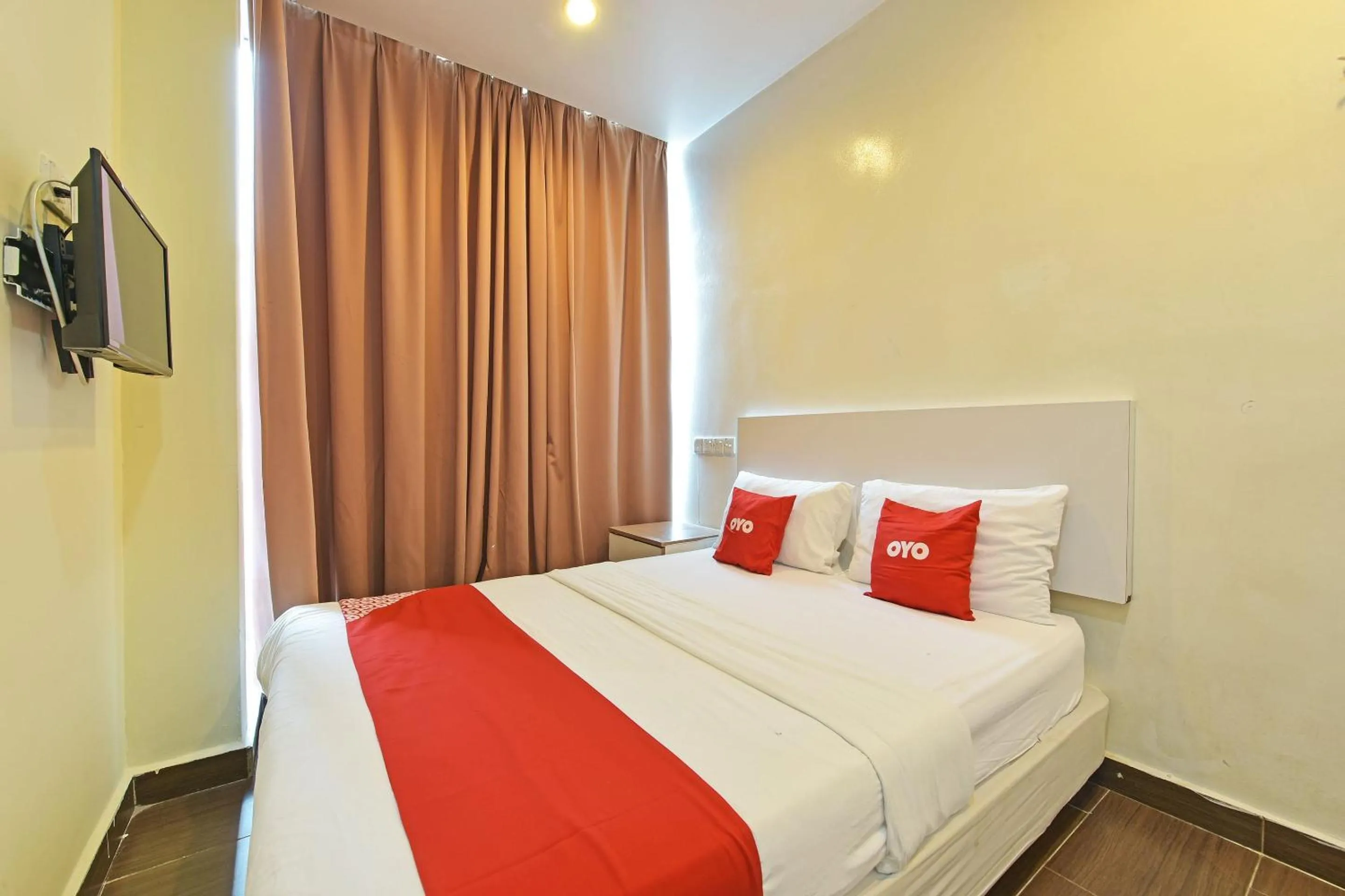 Bedroom, Bed in OYO 90853 New Soho Hotel