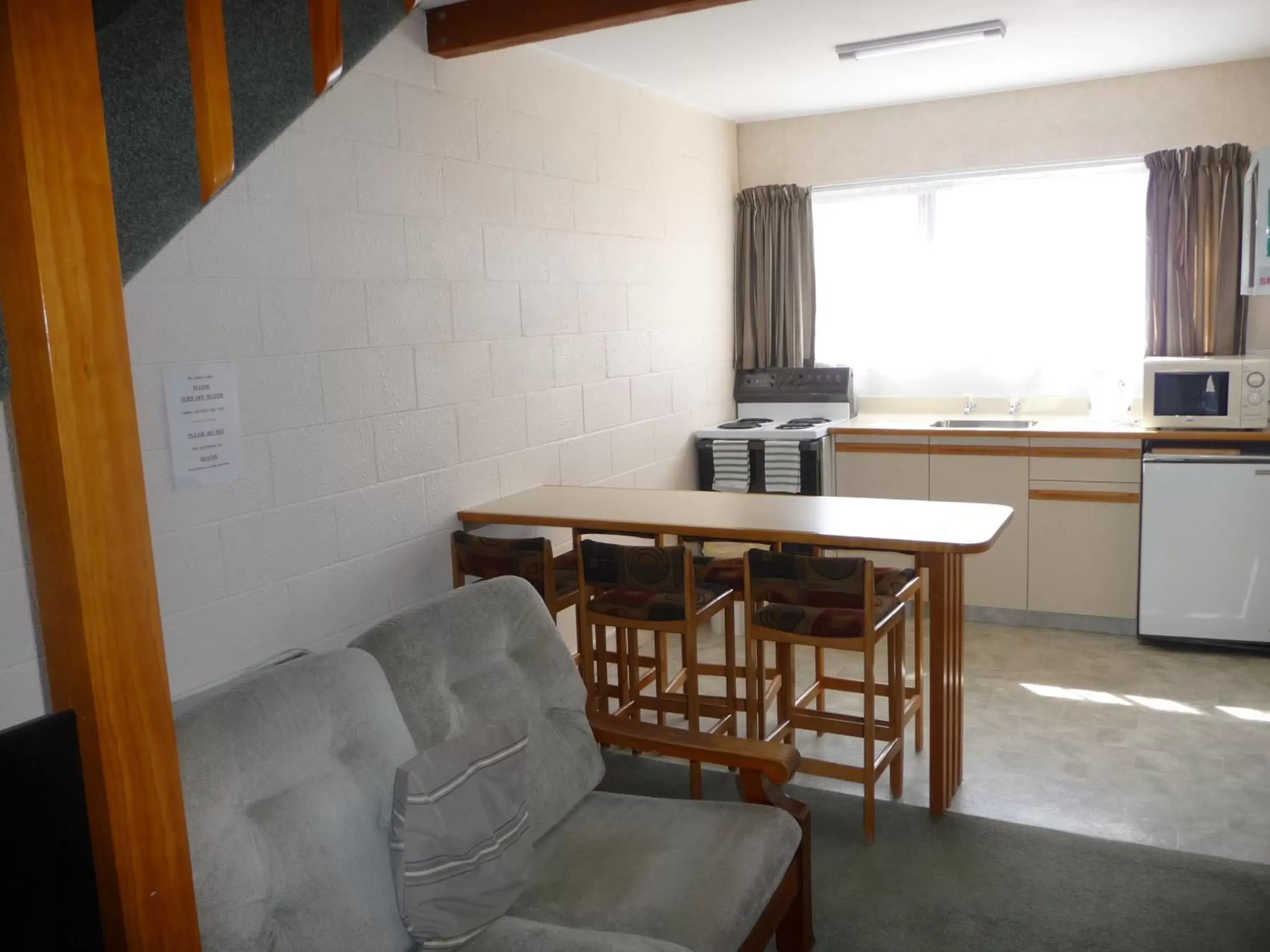 Two-Bedroom Family Apartment - Split Level in Coachman's Lodge Motel Two-Bedroom Family Apartment - Split Level in Coachman's Lodge Motel