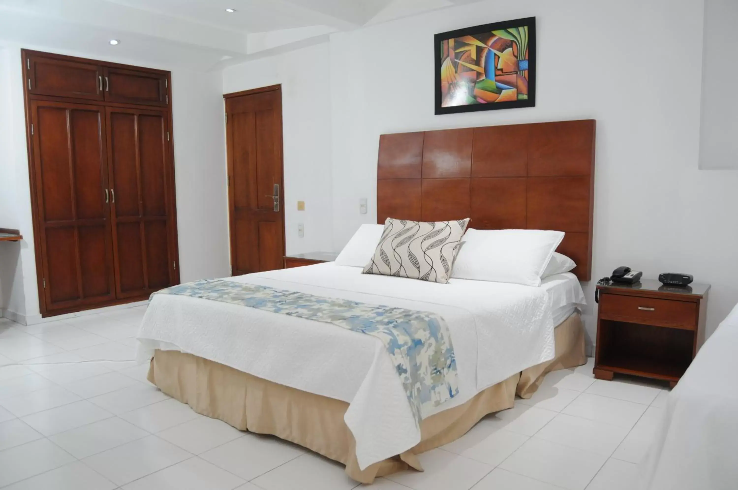 Guests, Bed in Coral Reef Hotel