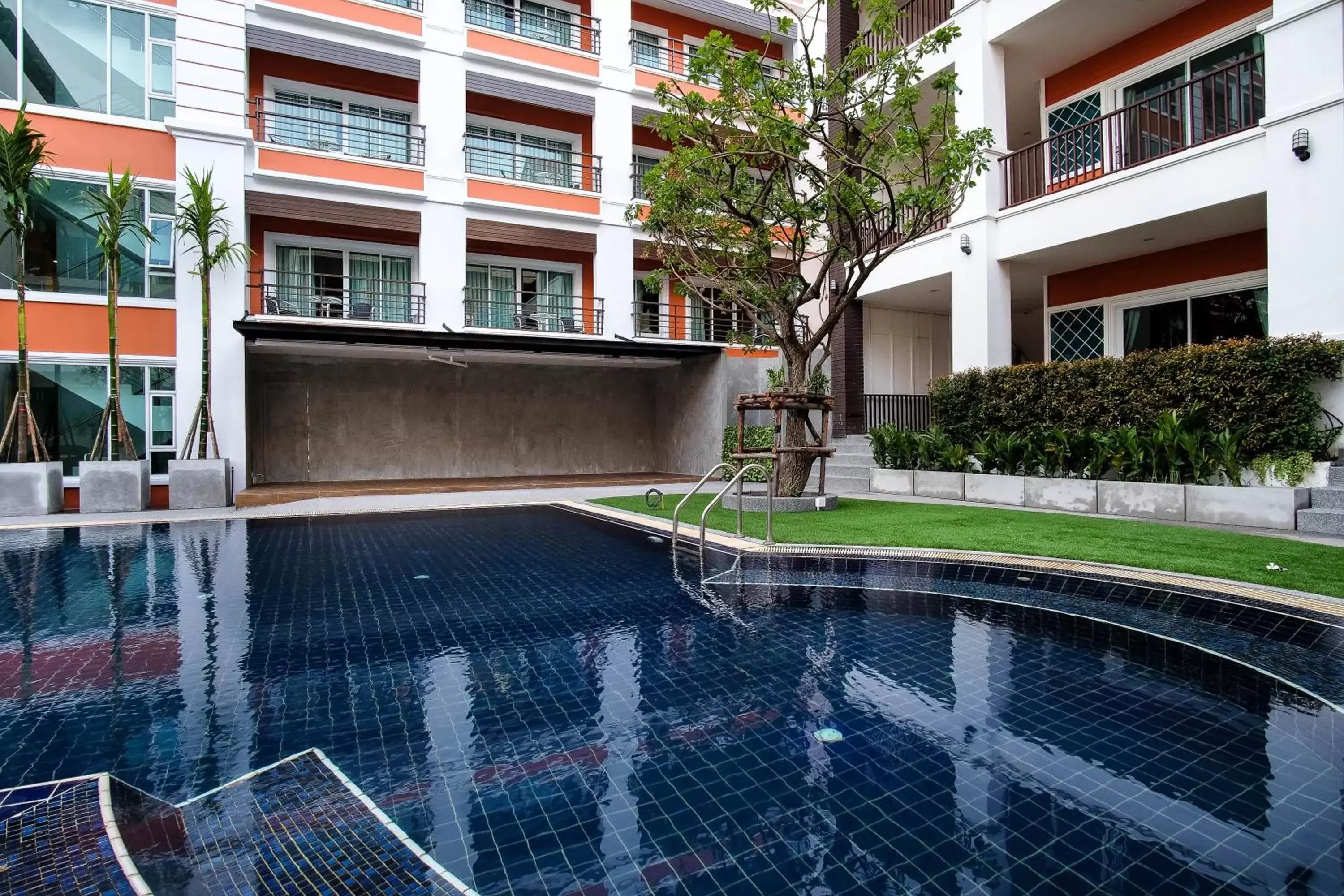 Swimming pool, Property Building in FX Hotel Pattaya
