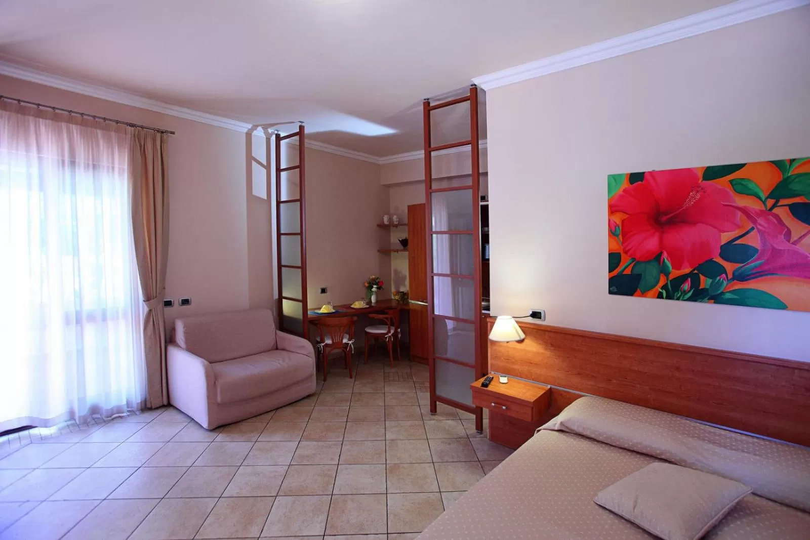 Living room, Bed in Residence Hotel La Giara