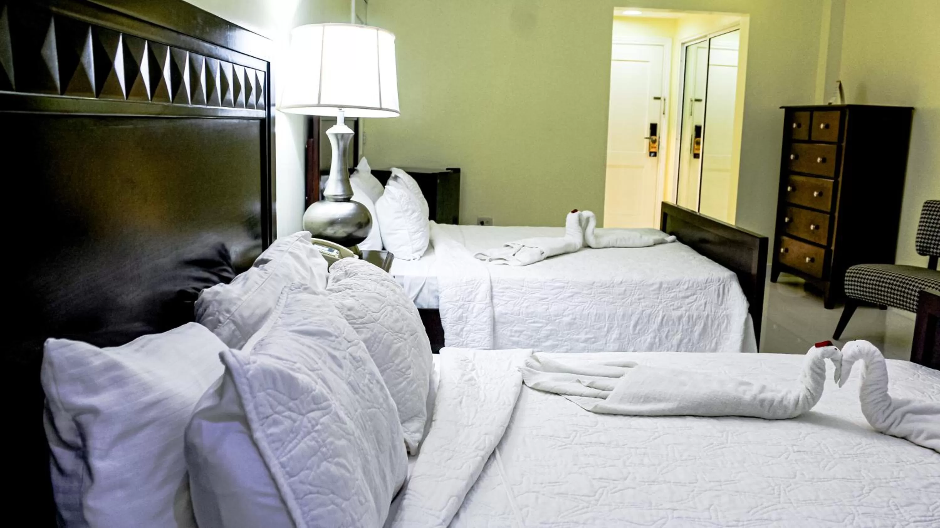 Bed in Golden House Hotel & Convention Center