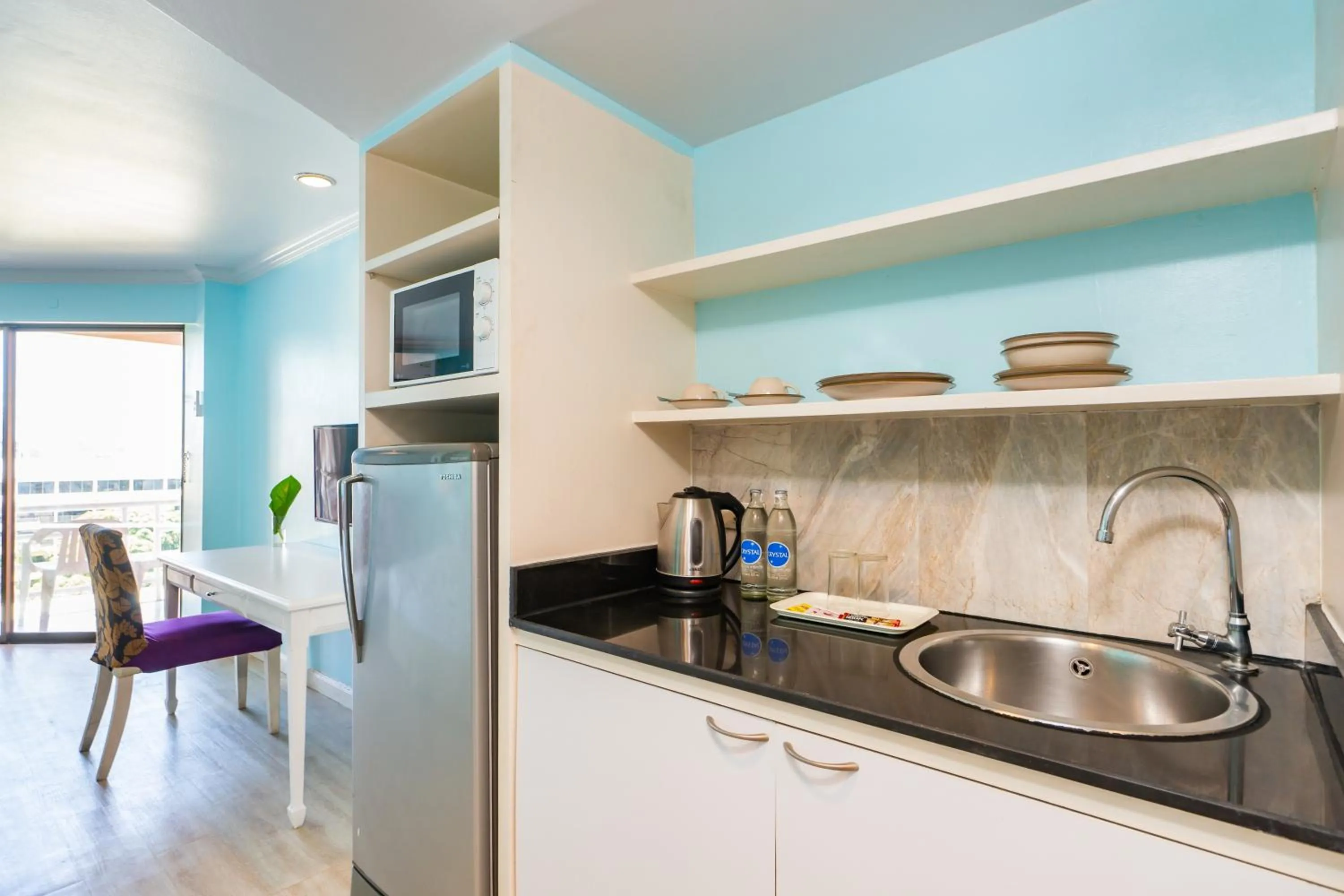 Kitchen or kitchenette in Bella Villa Metro