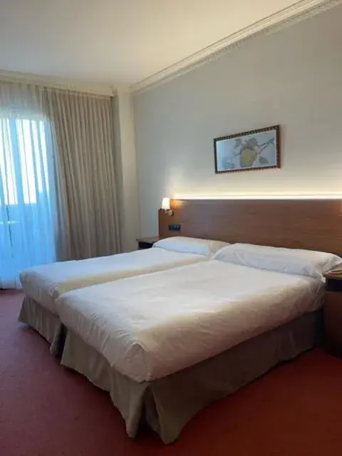 Bed in Hotel Spa Milagros Golf