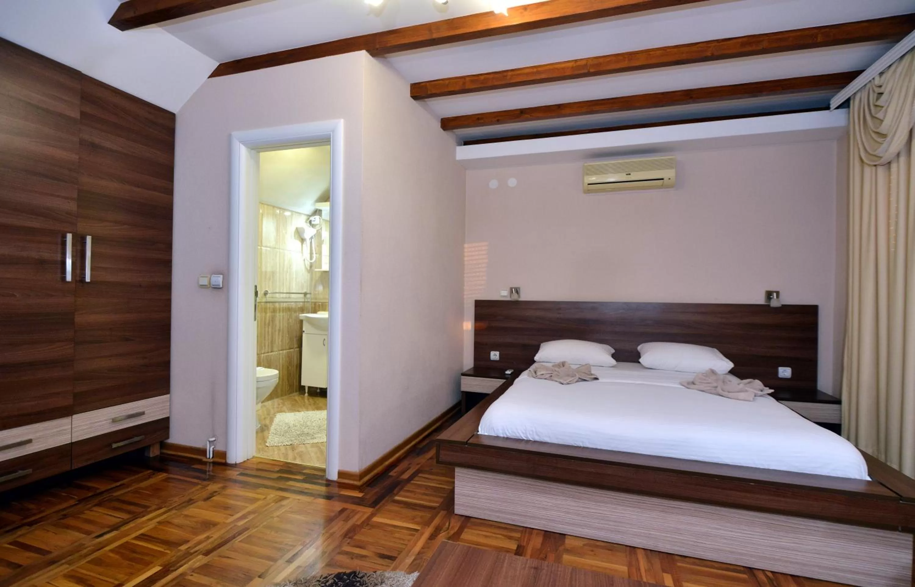 Bed in Garni Hotel Kaća