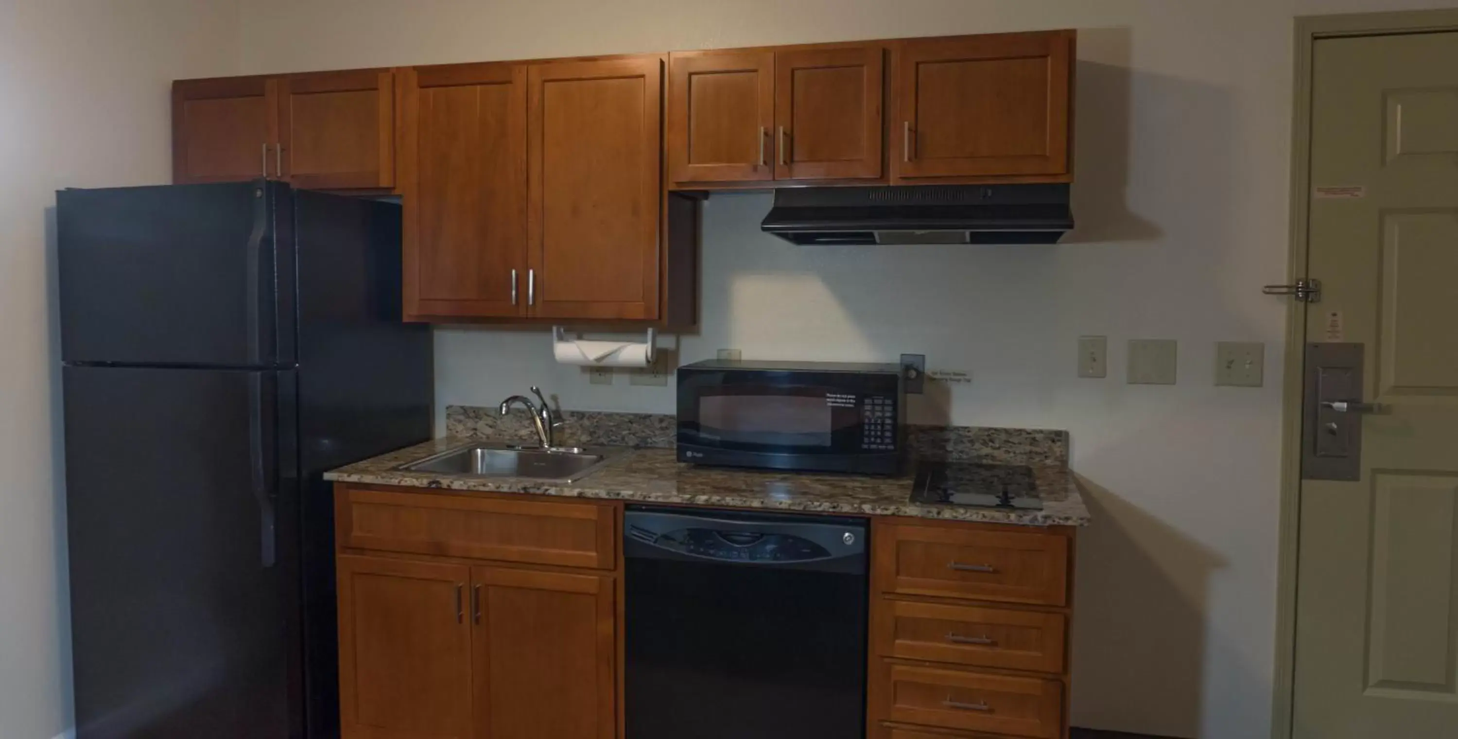 Photo of the whole room, Kitchen/Kitchenette in Candlewood Suites Abilene, an IHG Hotel