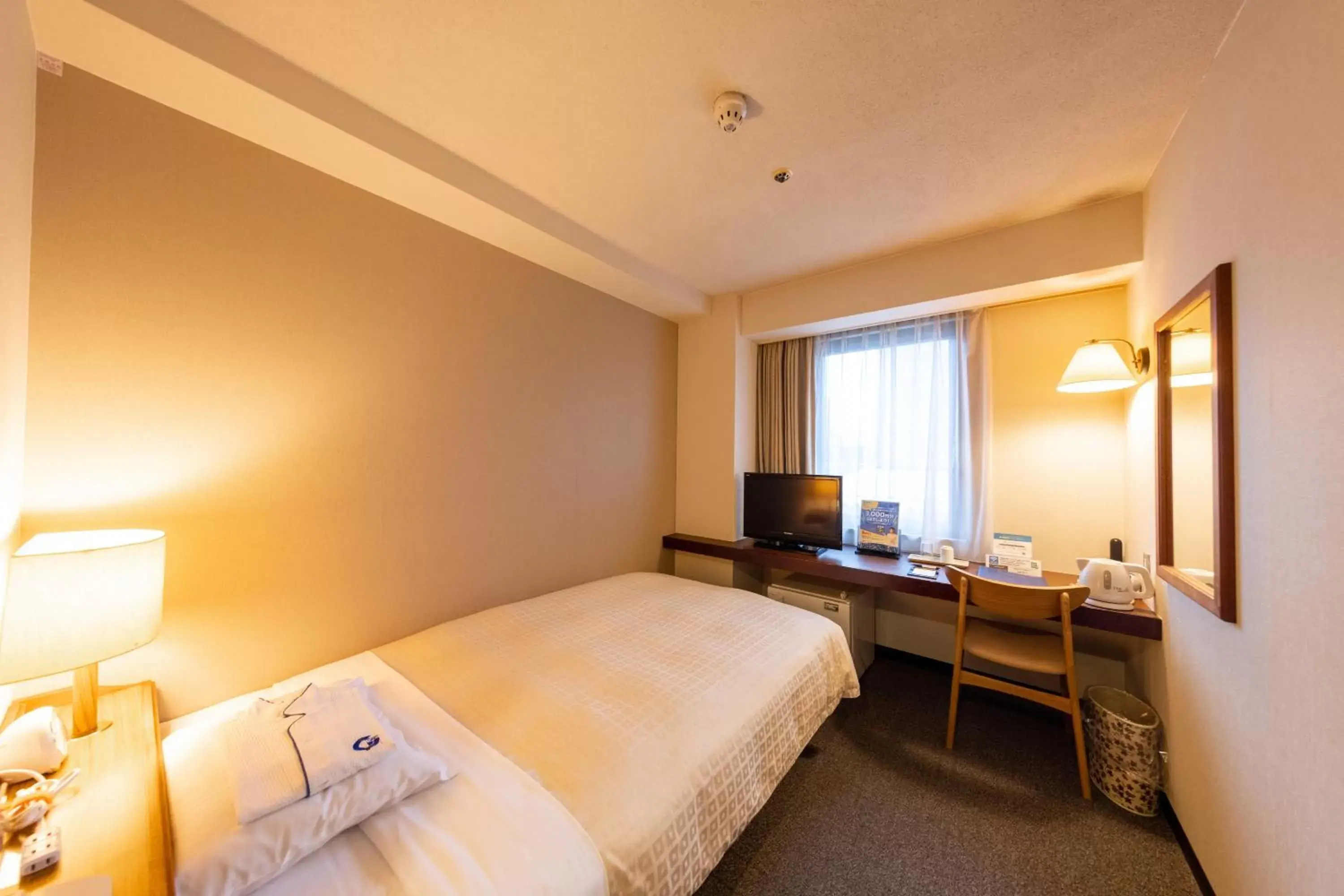 Bed in Nagaoka Grand Hotel