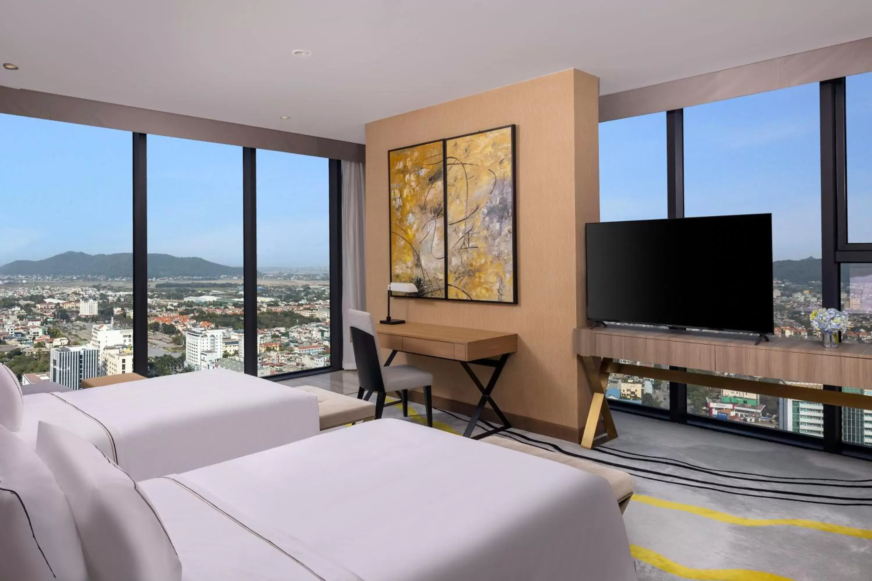 Bed, TV/Entertainment Center in Melia Vinpearl Thanh Hoa